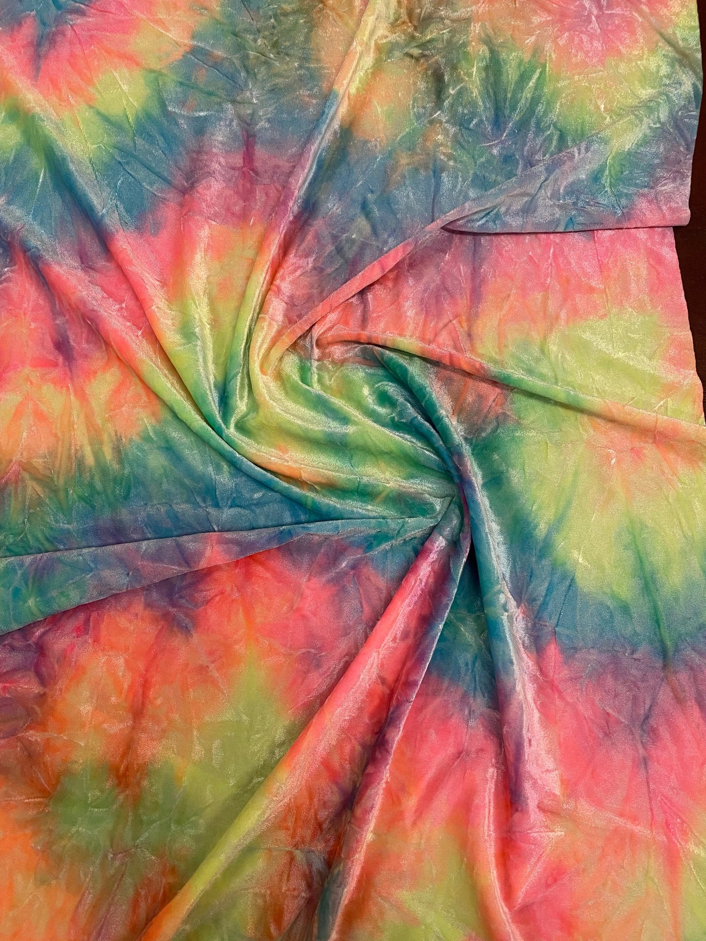 Rainbow multi pastel tie dye Luxury crushed velvet 4-way stretch 58-69” Sold by the YD. Ships Worldwide from Los Angeles California USA.