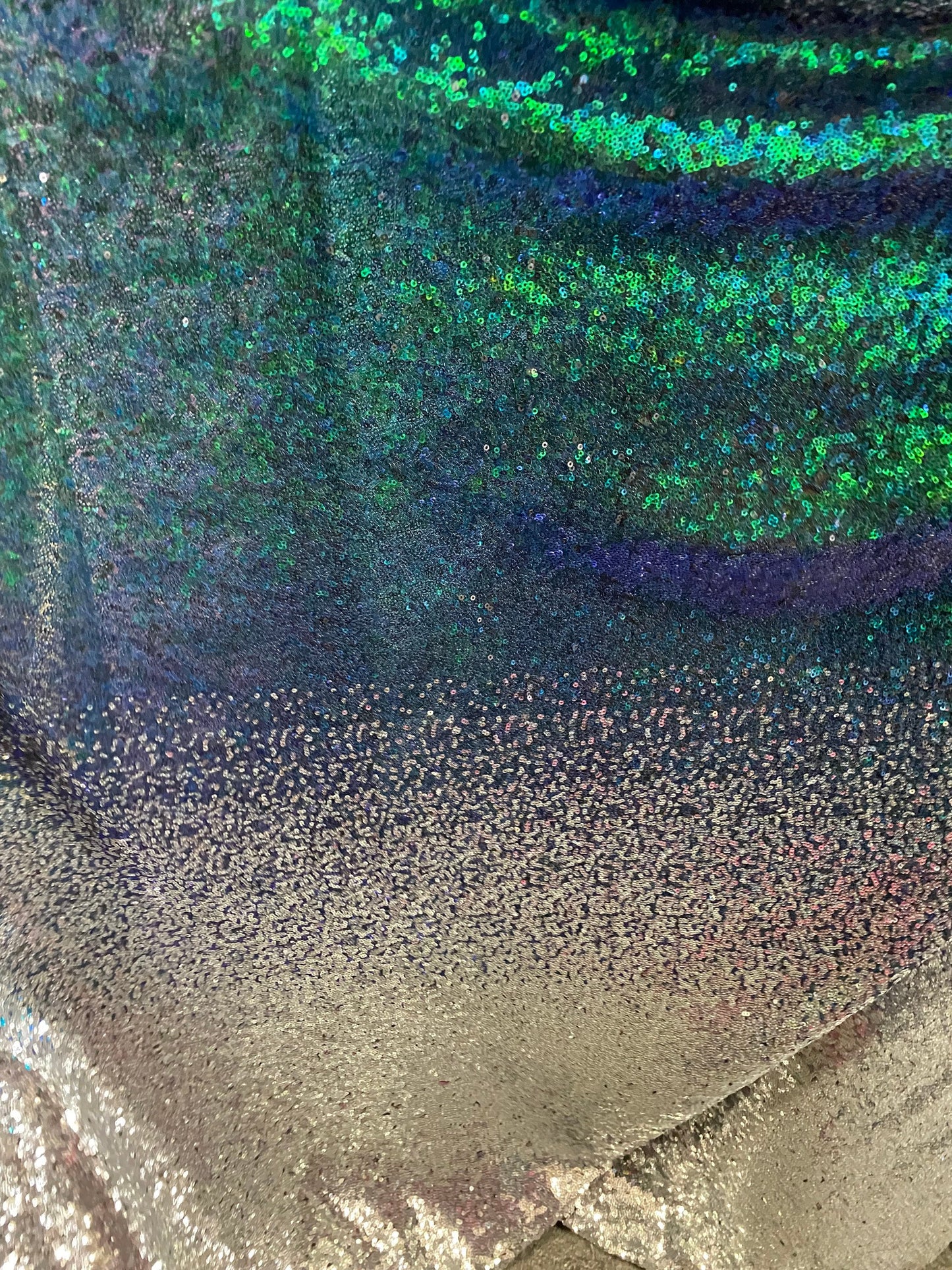 New Ombré design print on iridescent mini cosmic sequins embroidered on stretch mesh 2-way 55/57” Sold by the YD. Ships Worldwide
