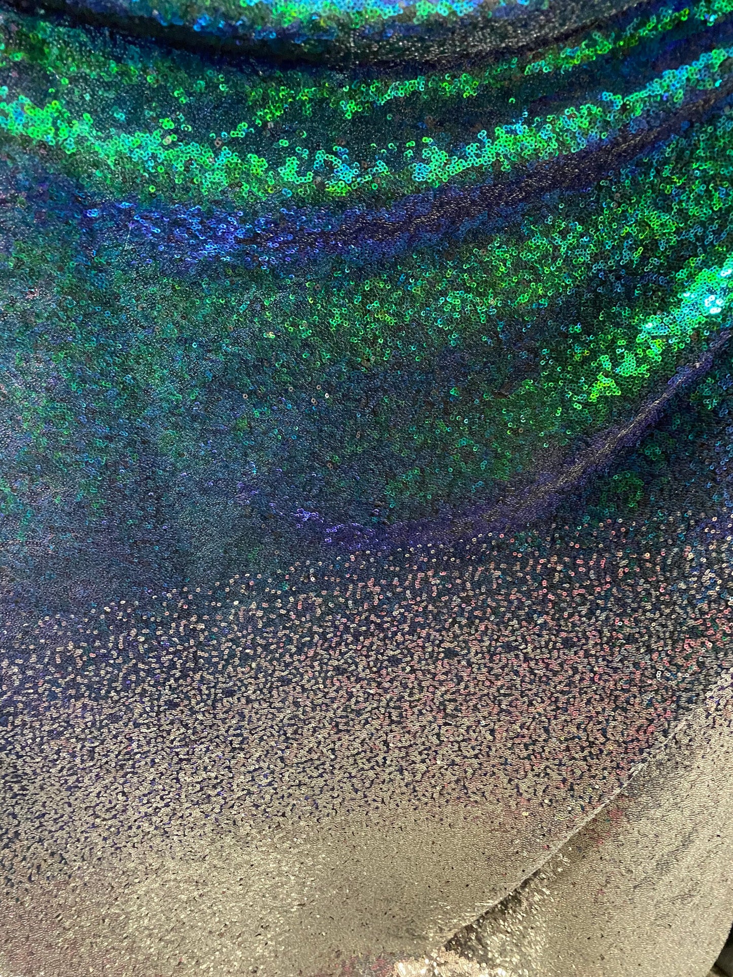 New Ombré design print on iridescent mini cosmic sequins embroidered on stretch mesh 2-way 55/57” Sold by the YD. Ships Worldwide