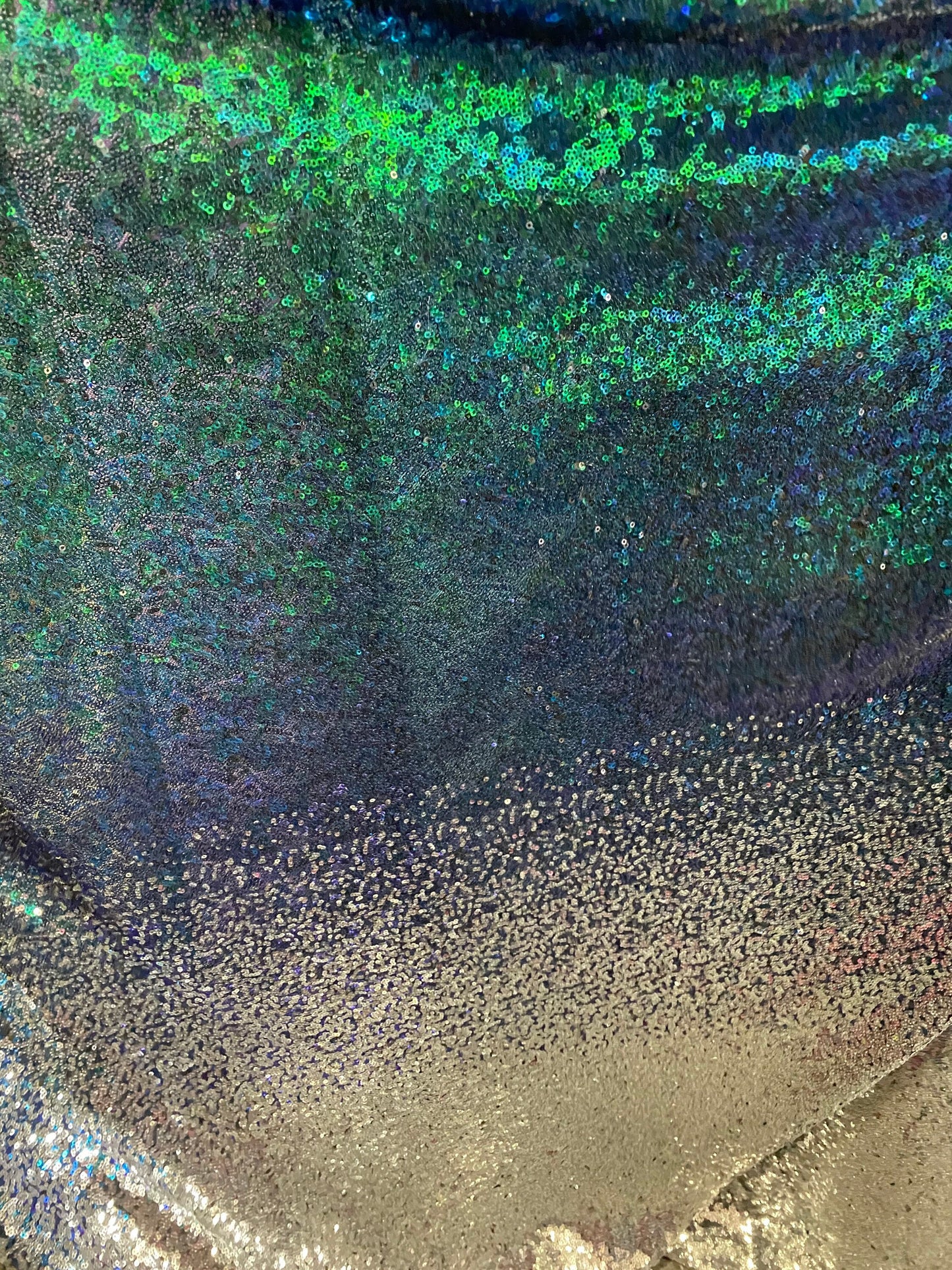 New Ombré design print on iridescent mini cosmic sequins embroidered on stretch mesh 2-way 55/57” Sold by the YD. Ships Worldwide