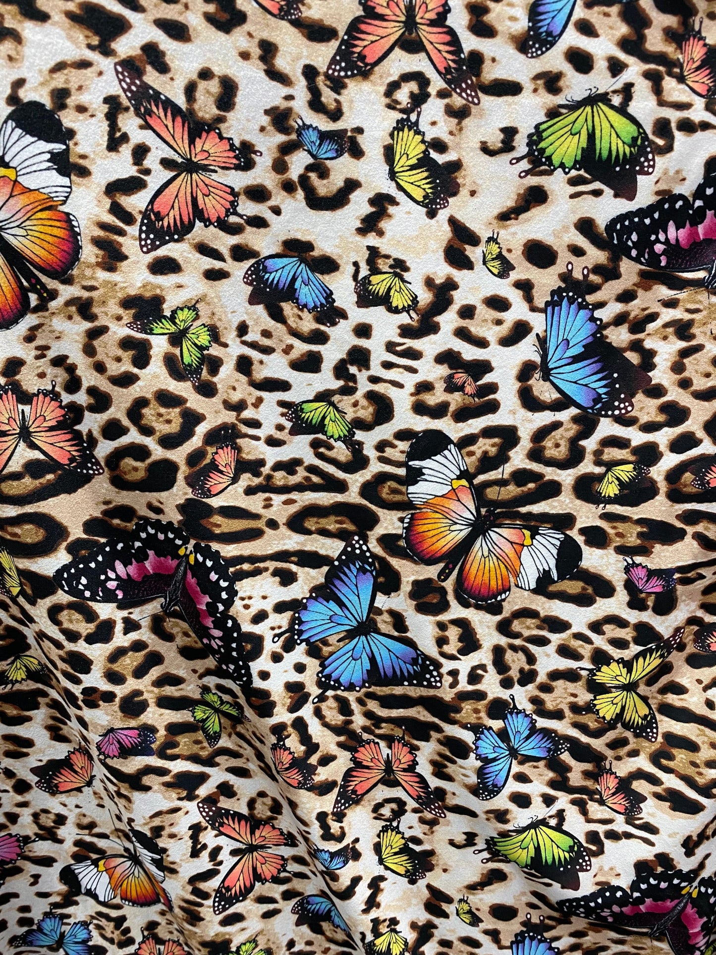 New butterfly design print on soft poly cotton spandex 4-way stretch 58/60” Sold by the YD. Ships Worldwide from Los Angeles California USA.
