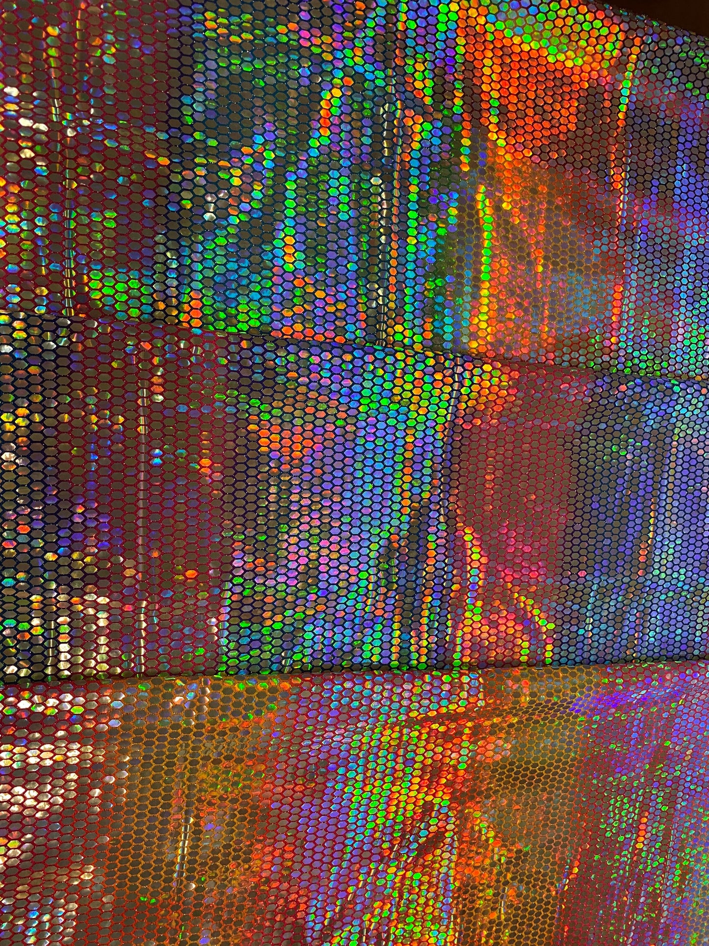 Hexagon tie dye Hologram sequins trans on Nylon metallic 2-way stretch 58/60” Sold by the YD. Ships worldwide from Los Angeles