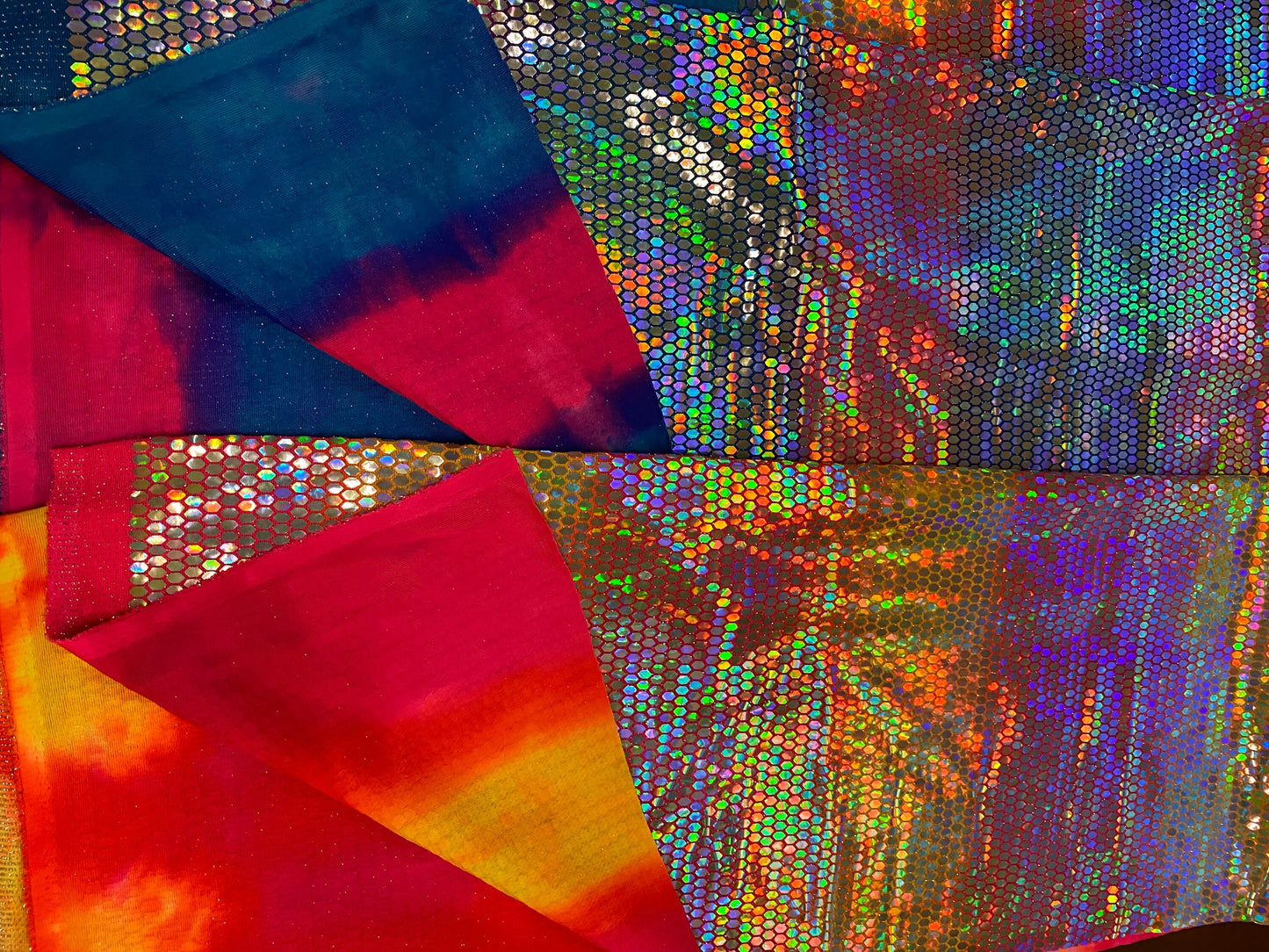 Hexagon tie dye Hologram sequins trans on Nylon metallic 2-way stretch 58/60” Sold by the YD. Ships worldwide from Los Angeles