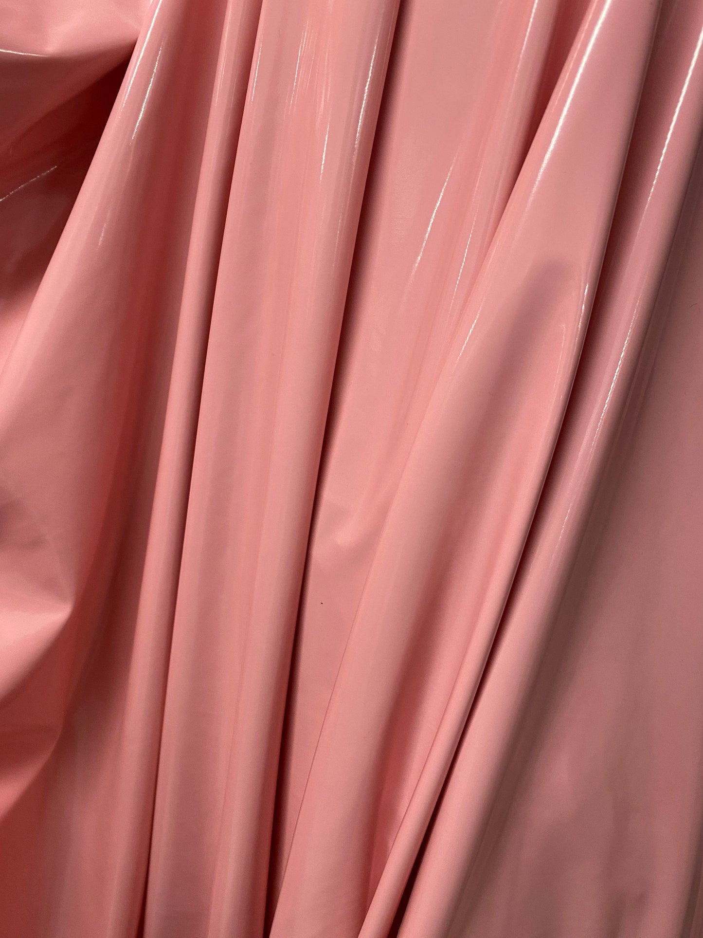 Shiny Latex dusty rose color nylon spandex 4way stretch 58/60” Sold by the YD. Ships worldwide from Los Angeles California USA.