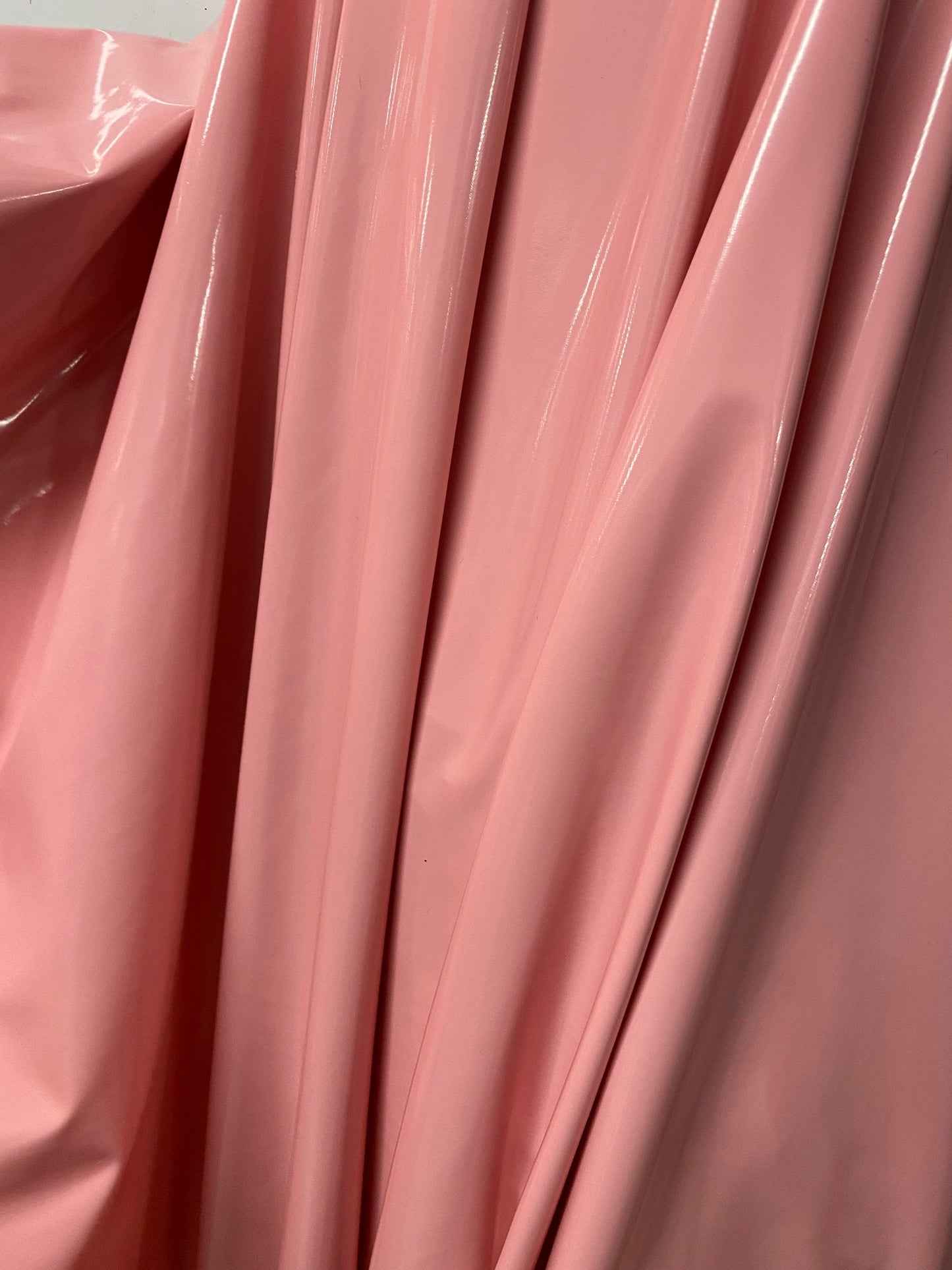 Shiny Latex dusty rose color nylon spandex 4way stretch 58/60” Sold by the YD. Ships worldwide from Los Angeles California USA.