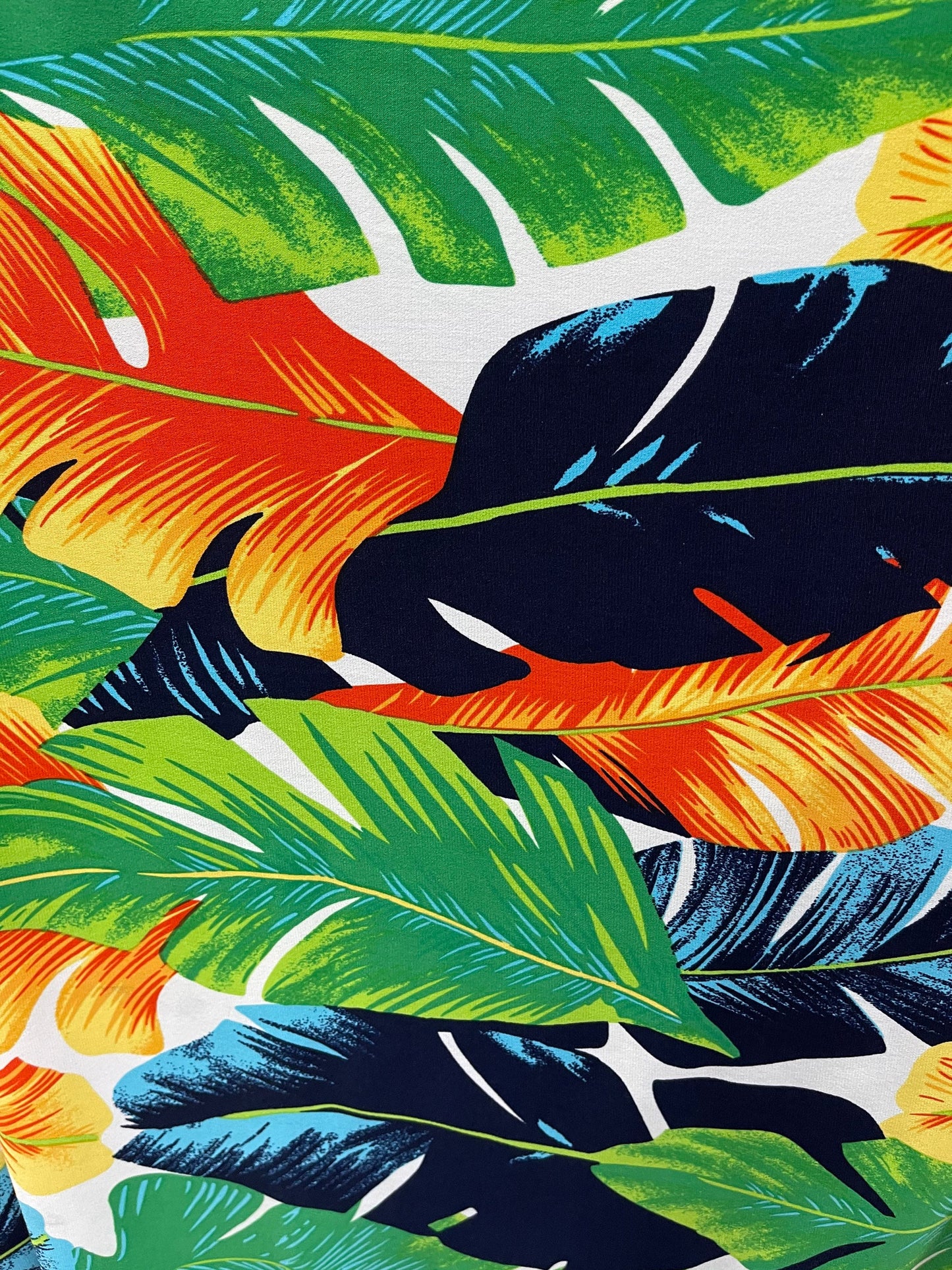 New tropical big leaf design multicolor print on poly spandex 4-way stretch medium weight 58/60” Sold by the YD. Ships Worldwide