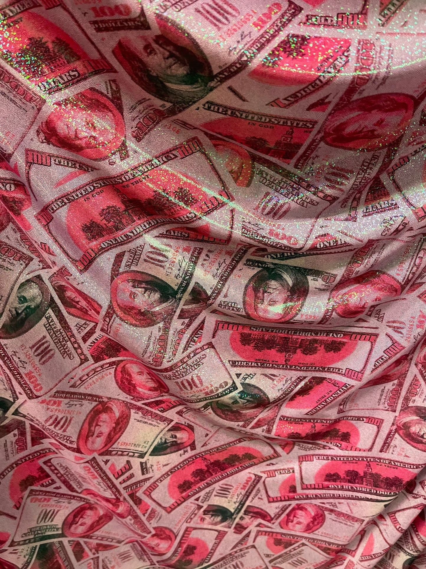 Money design 100 dollars bill print on metallic nylon spandex 4-way stretch 58/60” Sold by the YD. Ships Worldwide from Los Angeles cali.