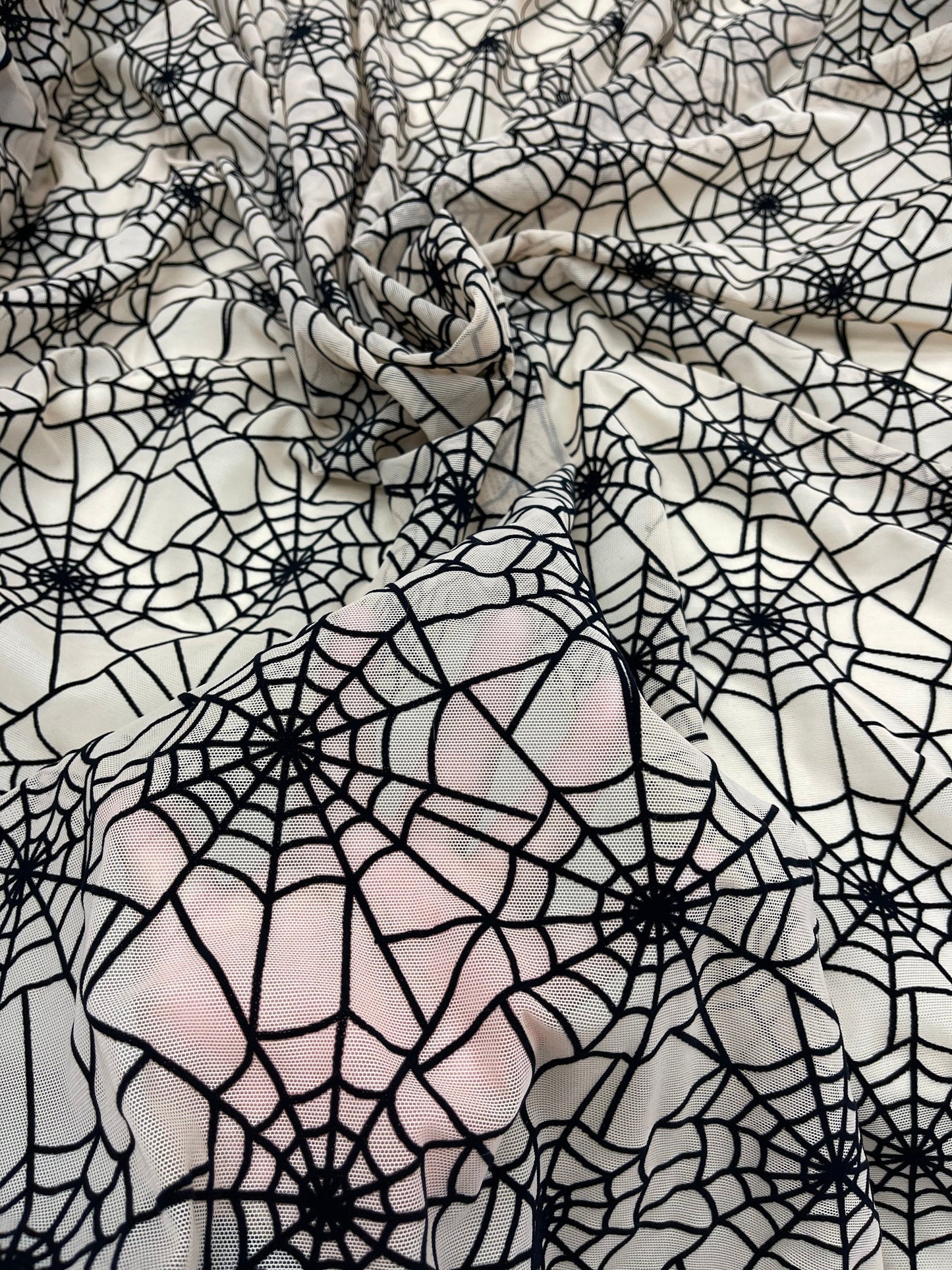 New Spider-Man design nude/back print on power mesh with flocking great quality nylon mesh 4-way stretch 58/60” Sold by the YD.