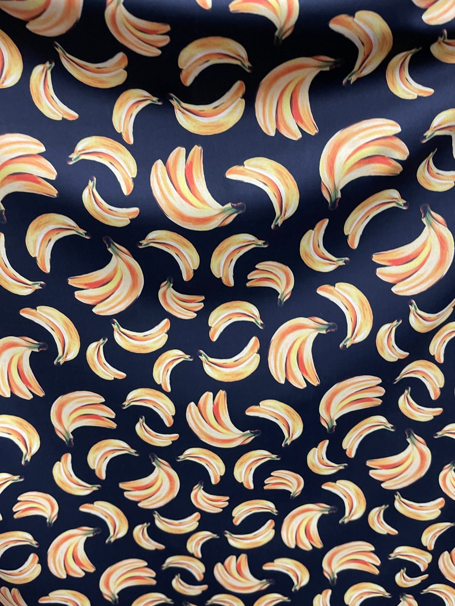 Bananas design black/yellow print on best nylon spandex 4way stretch 58/60” Sold by the YD. Ships worldwide from Los Angeles California USA.