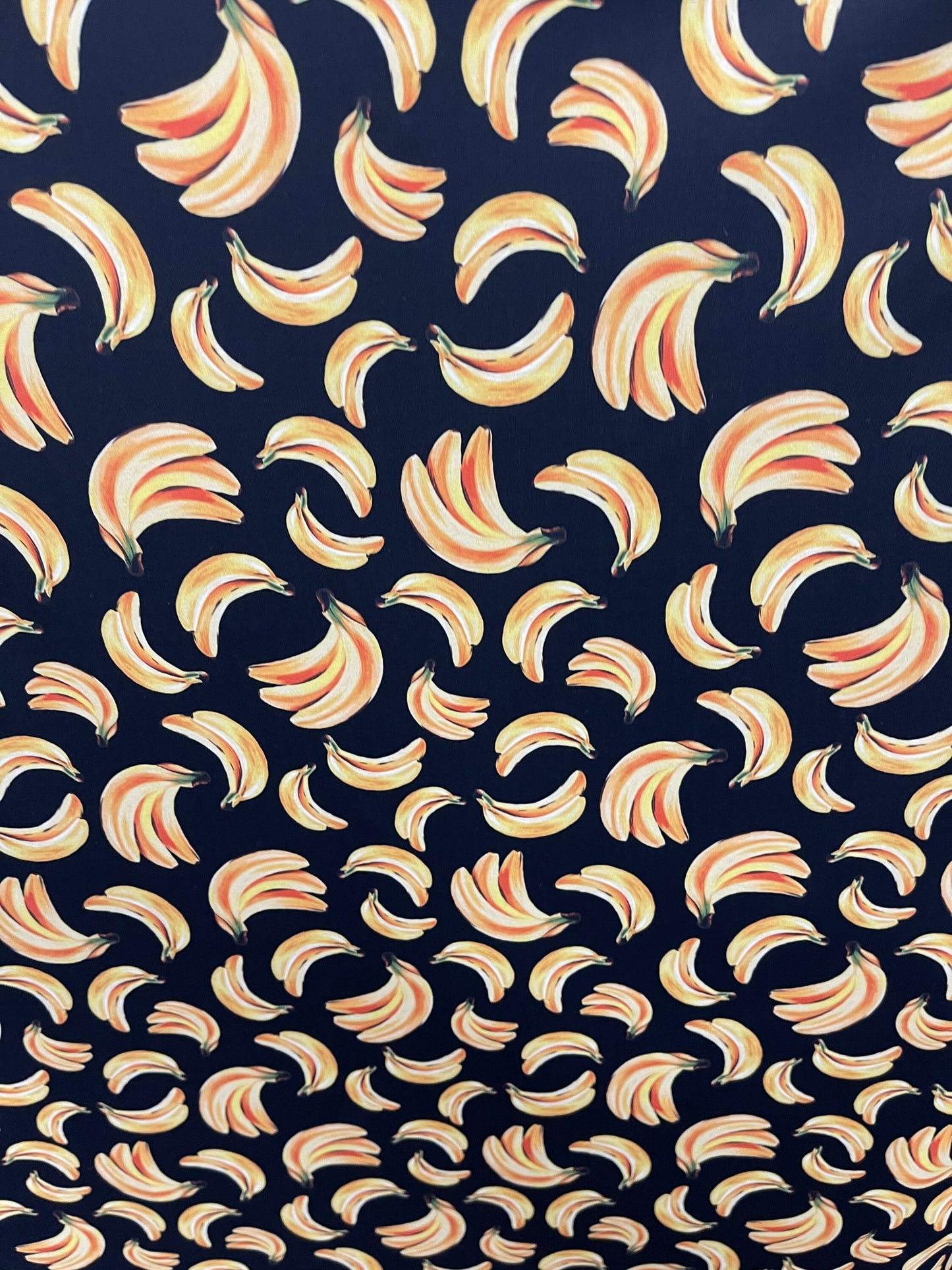 Bananas design black/yellow print on best nylon spandex 4way stretch 58/60” Sold by the YD. Ships worldwide from Los Angeles California USA.