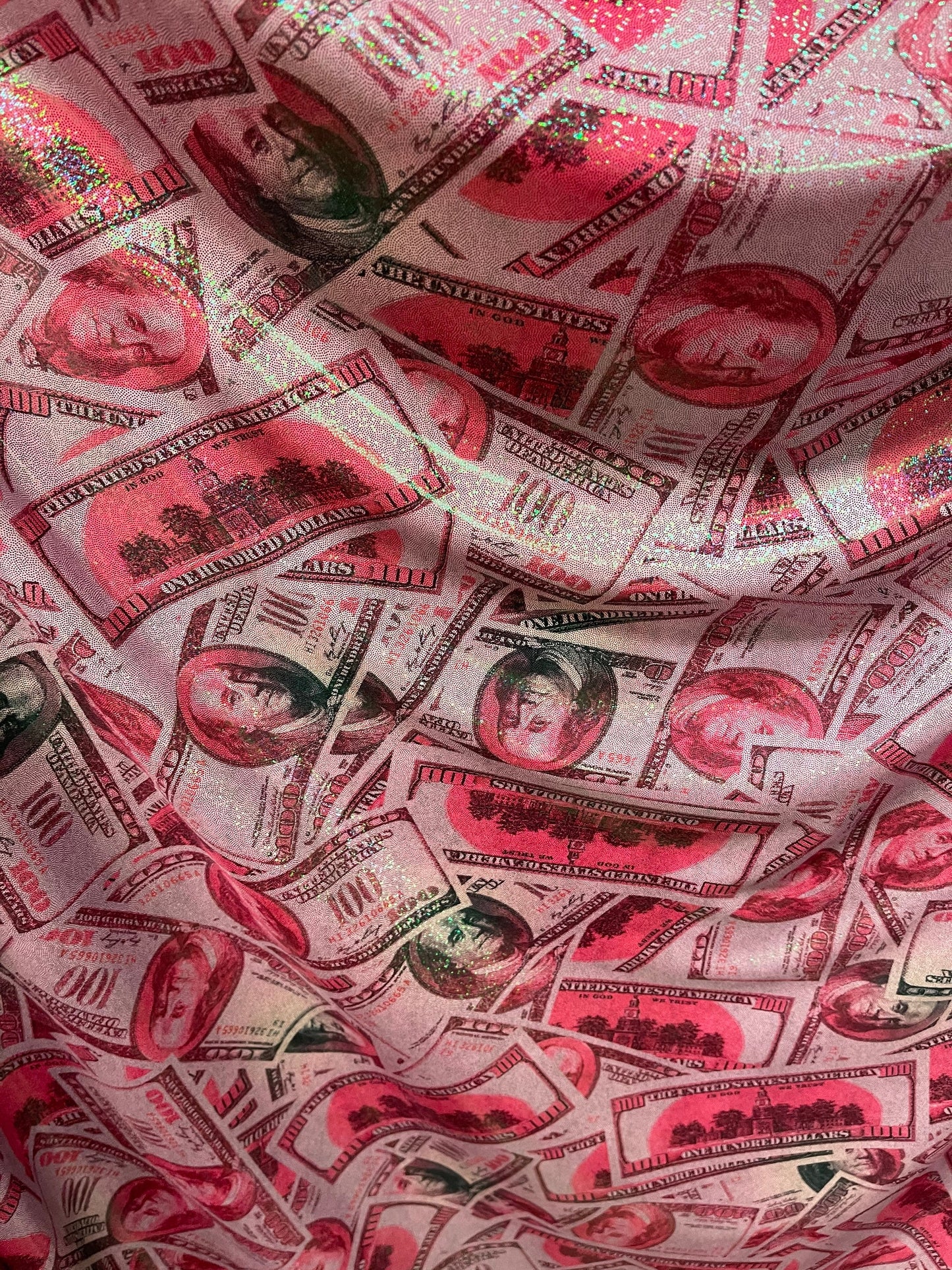 Money design 100 dollars bill print on metallic nylon spandex 4-way stretch 58/60” Sold by the YD. Ships Worldwide from Los Angeles cali.