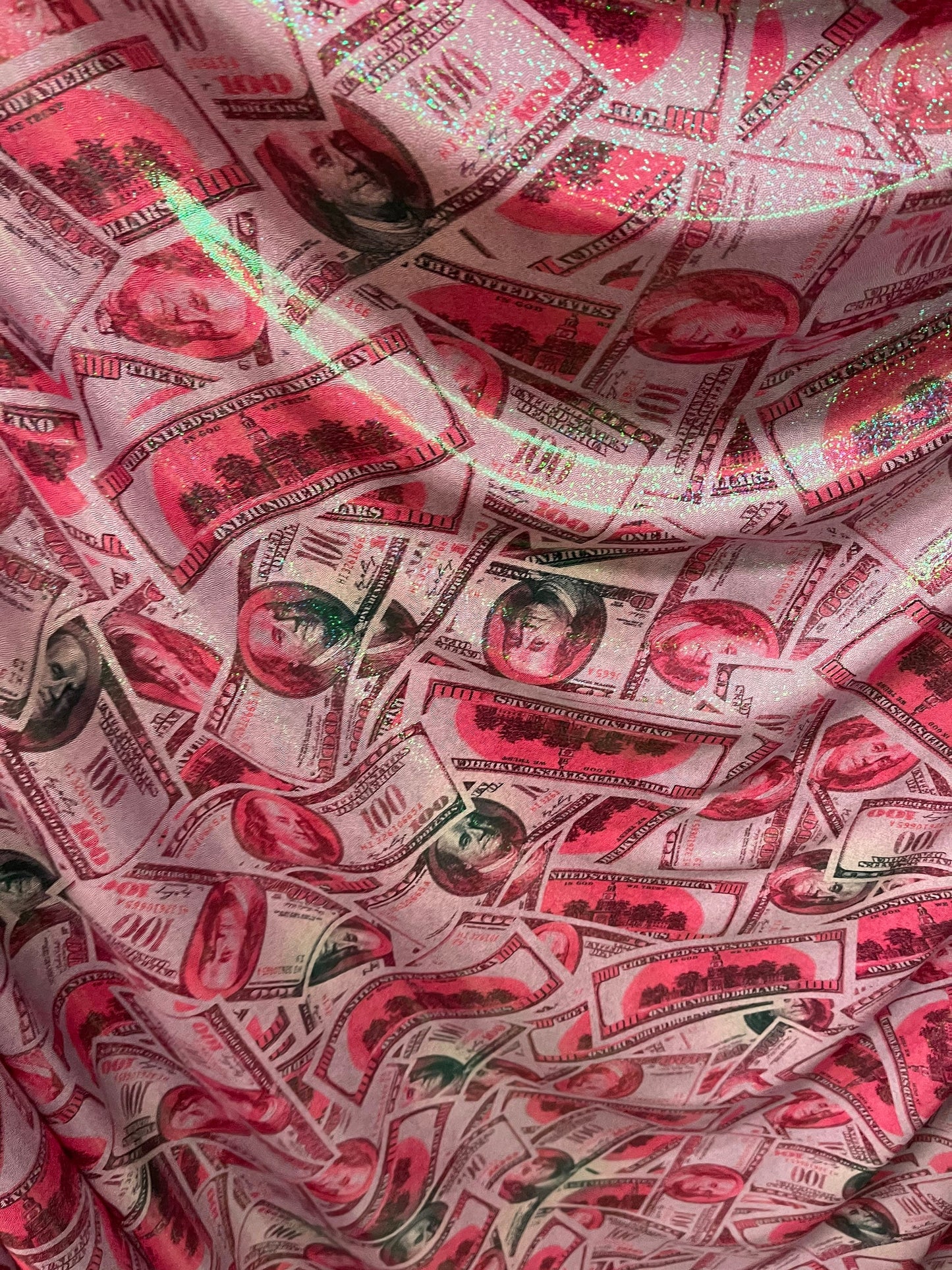 Money design 100 dollars bill print on metallic nylon spandex 4-way stretch 58/60” Sold by the YD. Ships Worldwide from Los Angeles cali.