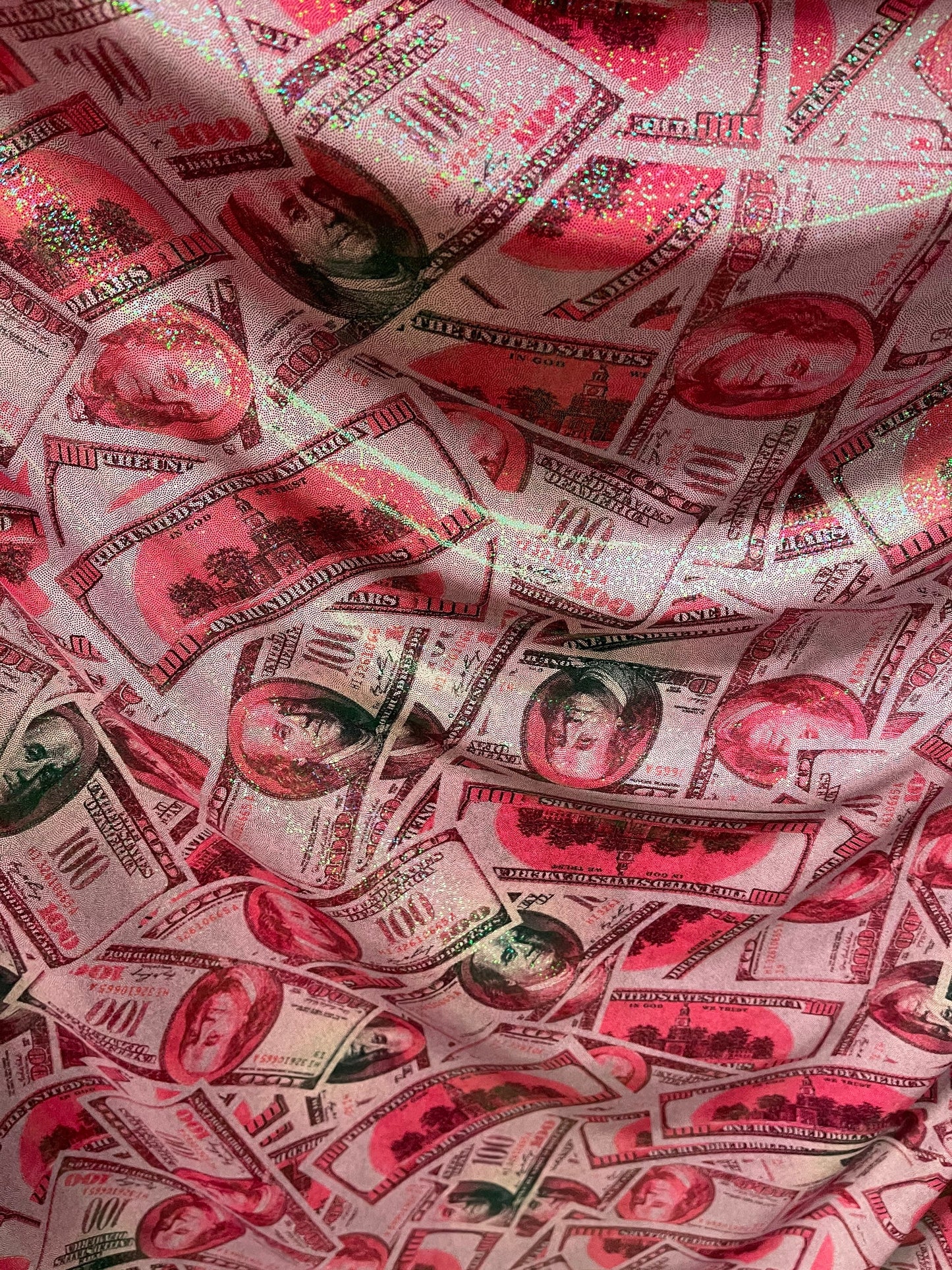 Money design 100 dollars bill print on metallic nylon spandex 4-way stretch 58/60” Sold by the YD. Ships Worldwide from Los Angeles cali.