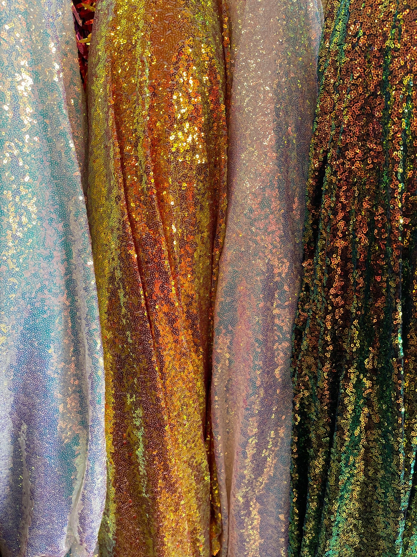 New iridescent mini disco sequins 3mm on stretch mesh 4way 58/60” Sold by the YD. Ships worldwide from Los Angeles California USA.