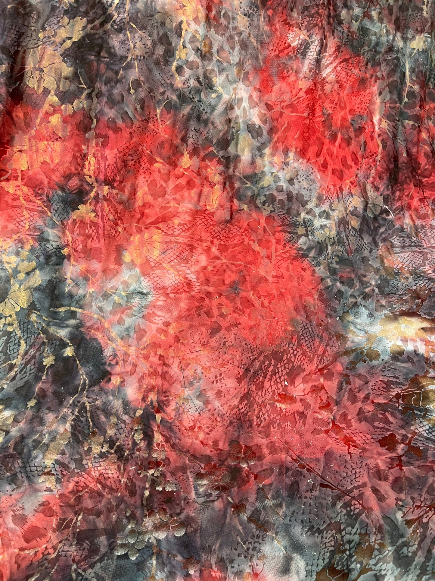 New tie dye poly spandex with foil red floral design medium weight 58/60” Sold by the YD. Ships Worldwide from Los Angeles California USA.