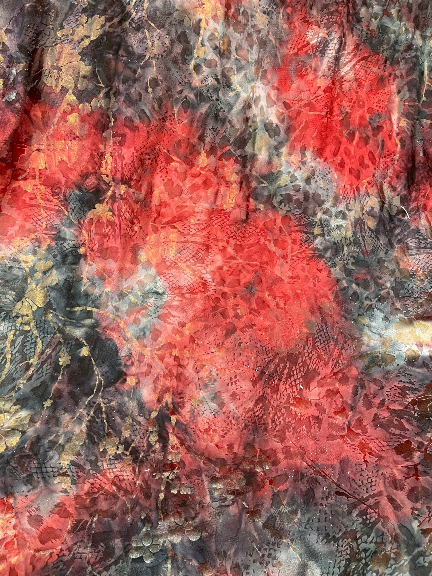 New tie dye poly spandex with foil red floral design medium weight 58/60” Sold by the YD. Ships Worldwide from Los Angeles California USA.