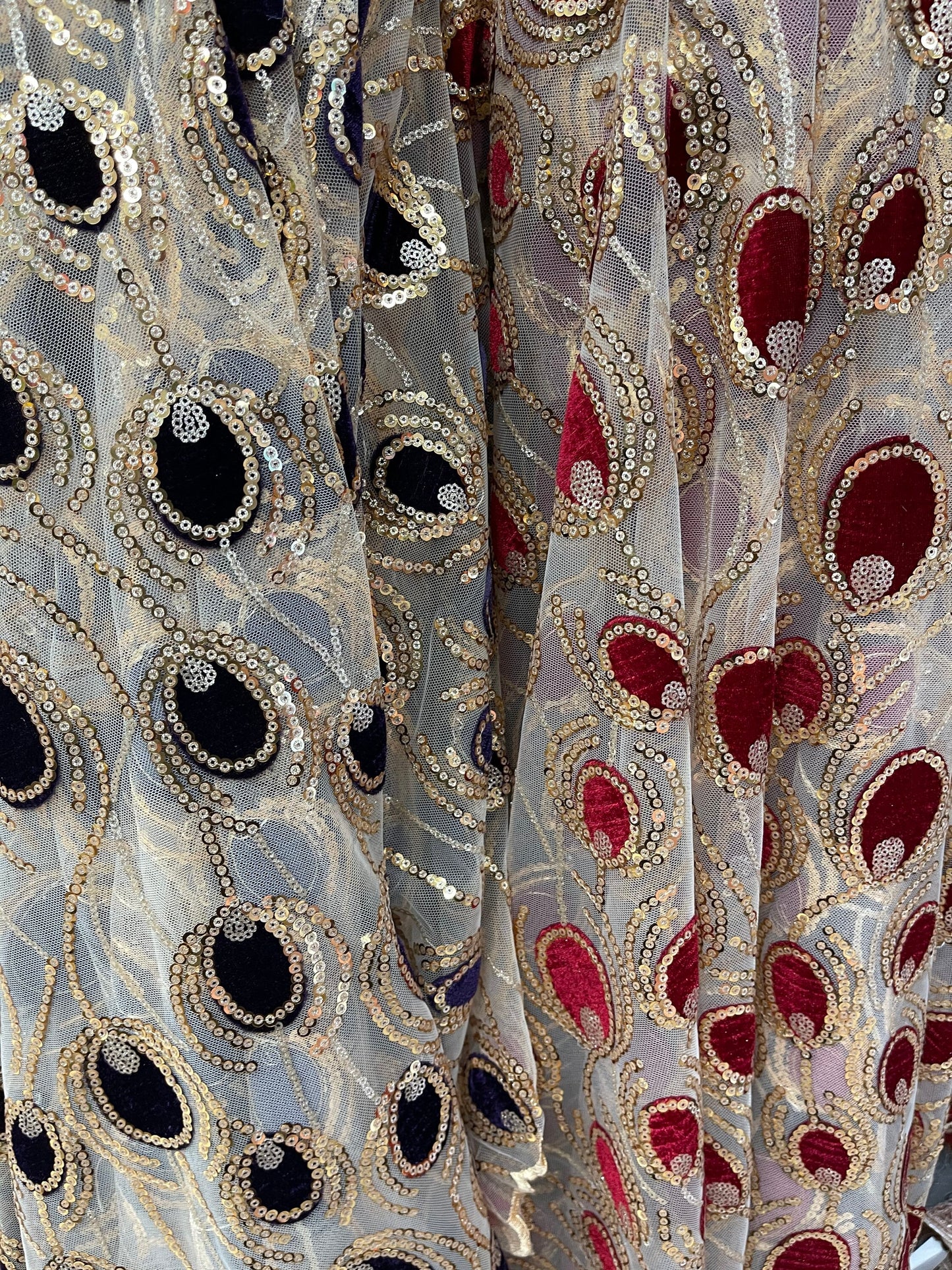 New Peacock design embroidered on stretch mesh 2-way 55/57 Sold by the YD. Ships Worldwide from Los Angeles California USA.