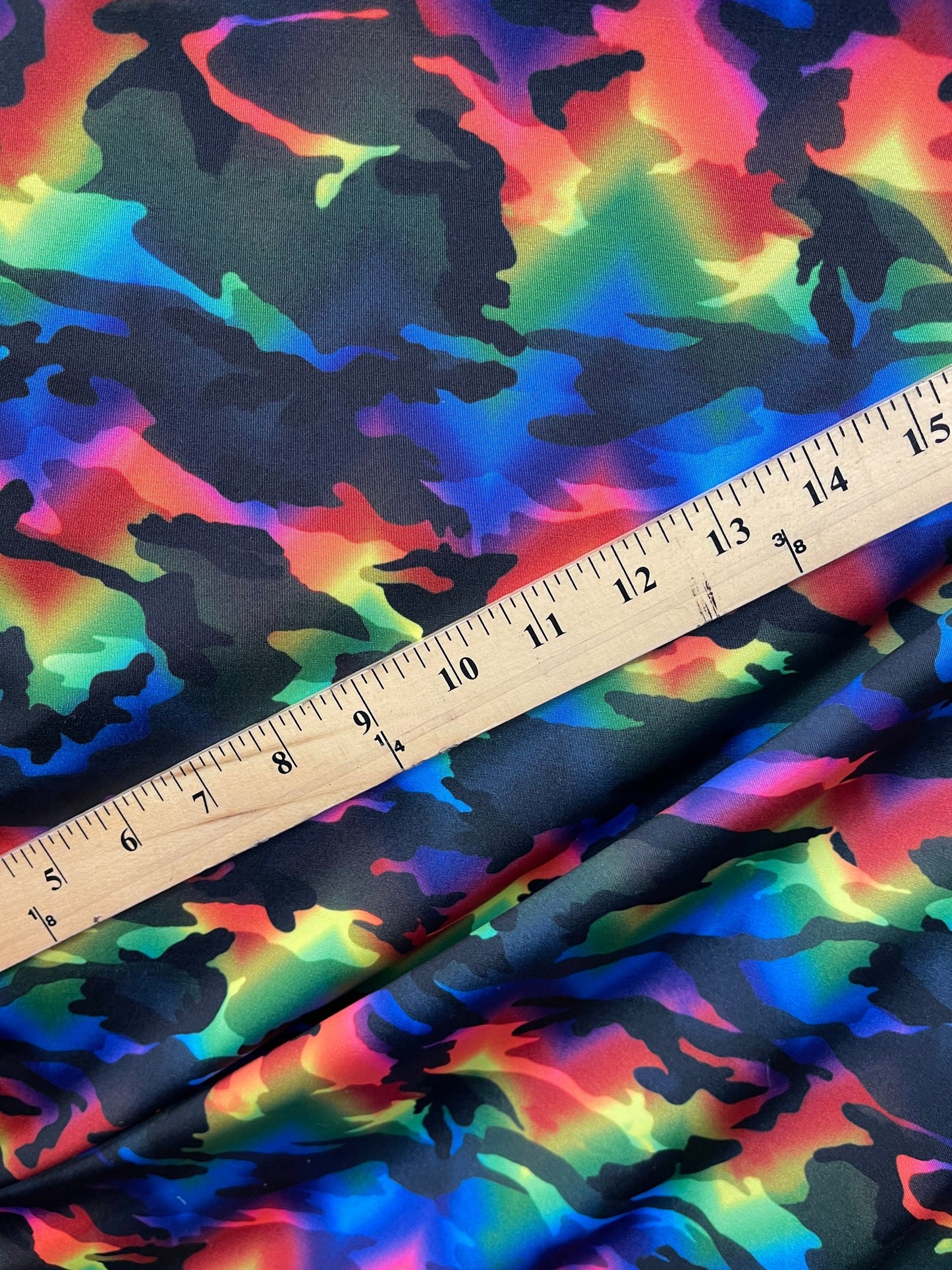 Camouflage design rainbow color print on great quality of Nylon spandex 4-way stretch 58/60” Sold by the YD. Ships Worldwide from L.A