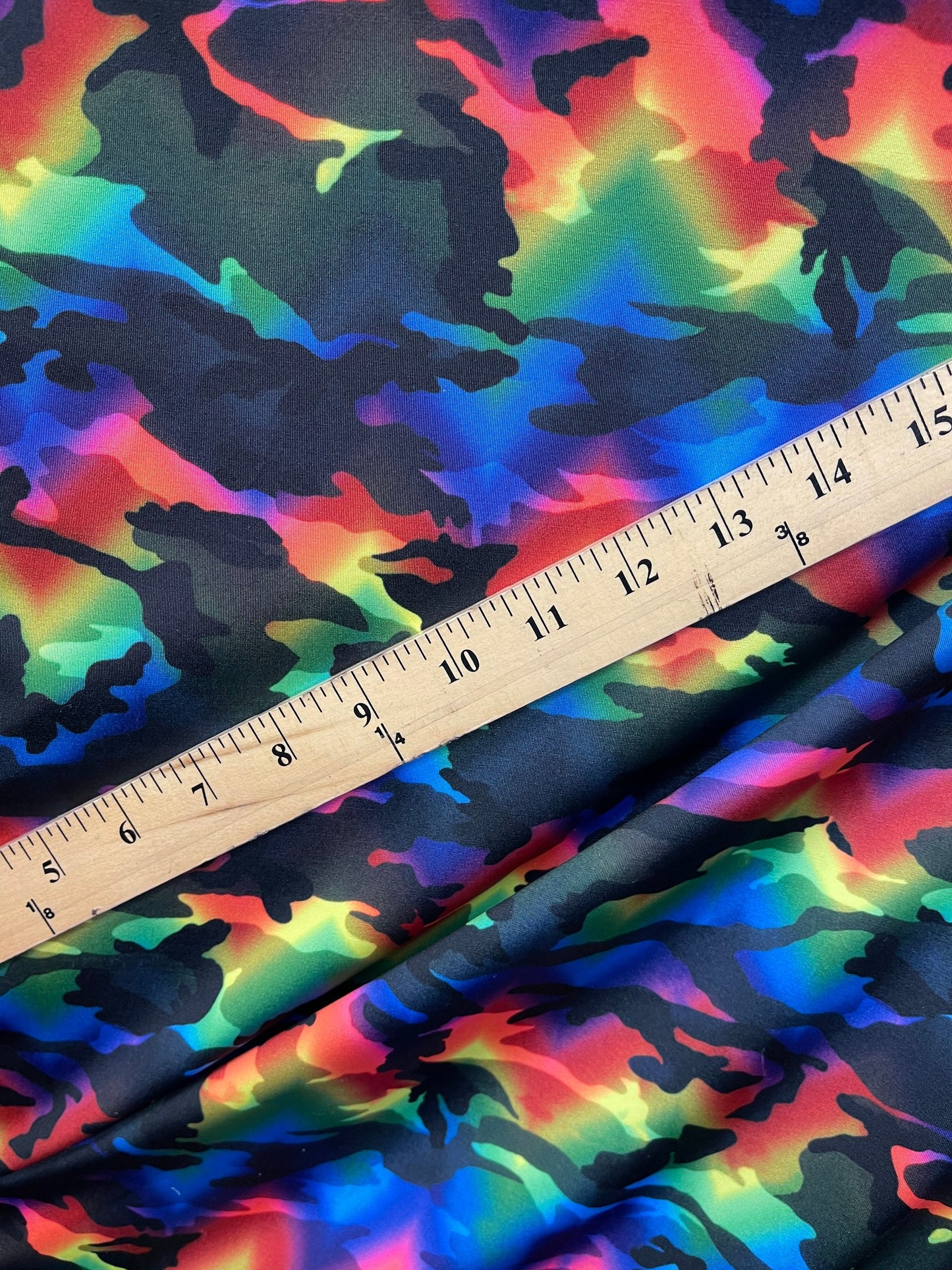 Camouflage design rainbow color print on great quality of Nylon spandex 4-way stretch 58/60” Sold by the YD. Ships Worldwide from L.A