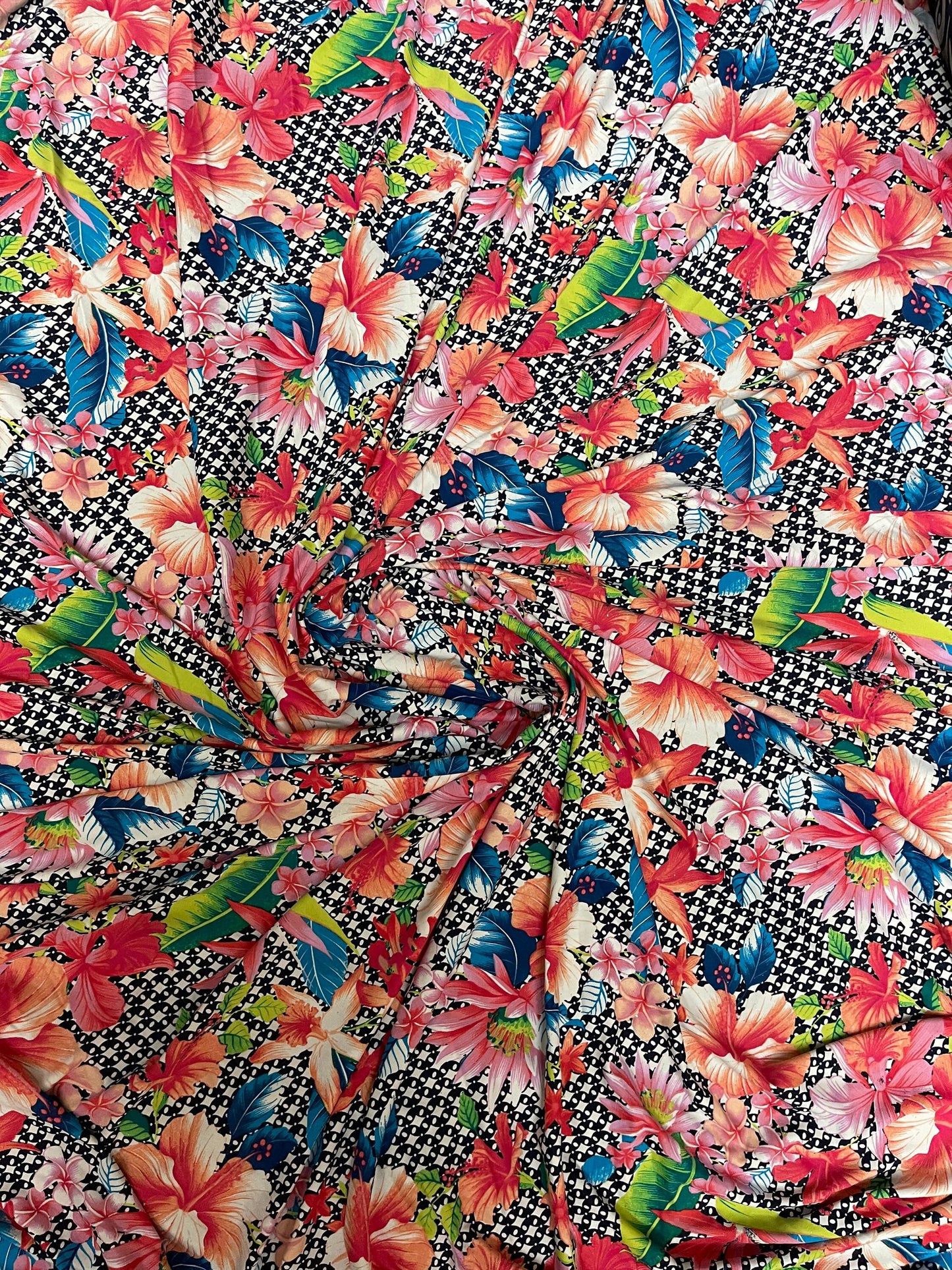Multi Flower design print on great quality of Poly Spandex 4-way stretch 58/60” Sold by the YD. Ships Worldwide from Los Angeles California