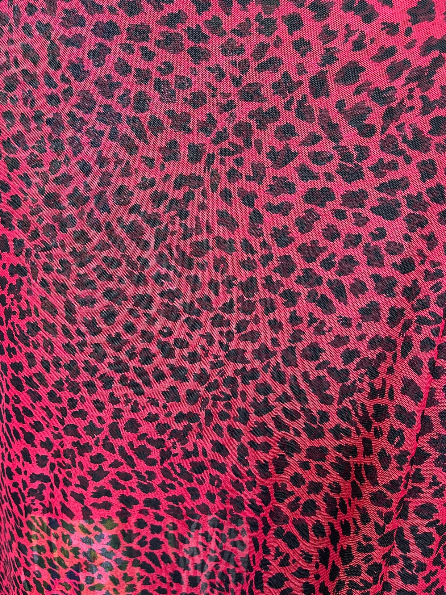 New power mesh animal printCheetah design red/black 4-way stretch 58/60” Sold by the YD. Ships worldwide from Los Angeles California USA.