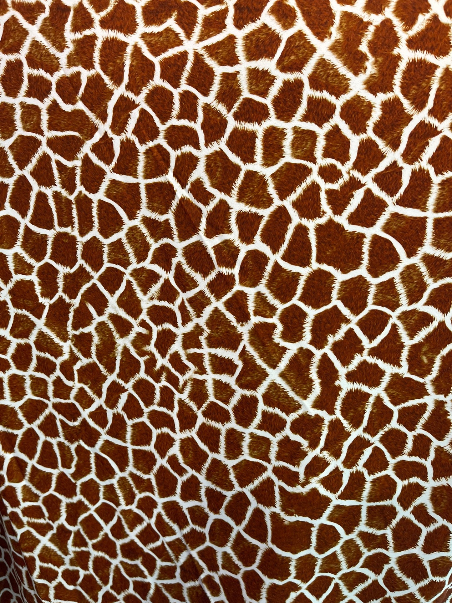 Exotic Giraffe design print on best quality of nylon spandex 4-way stretch 58/60” Sold by the YD. Ships Worldwide from Los Angeles CA USA.