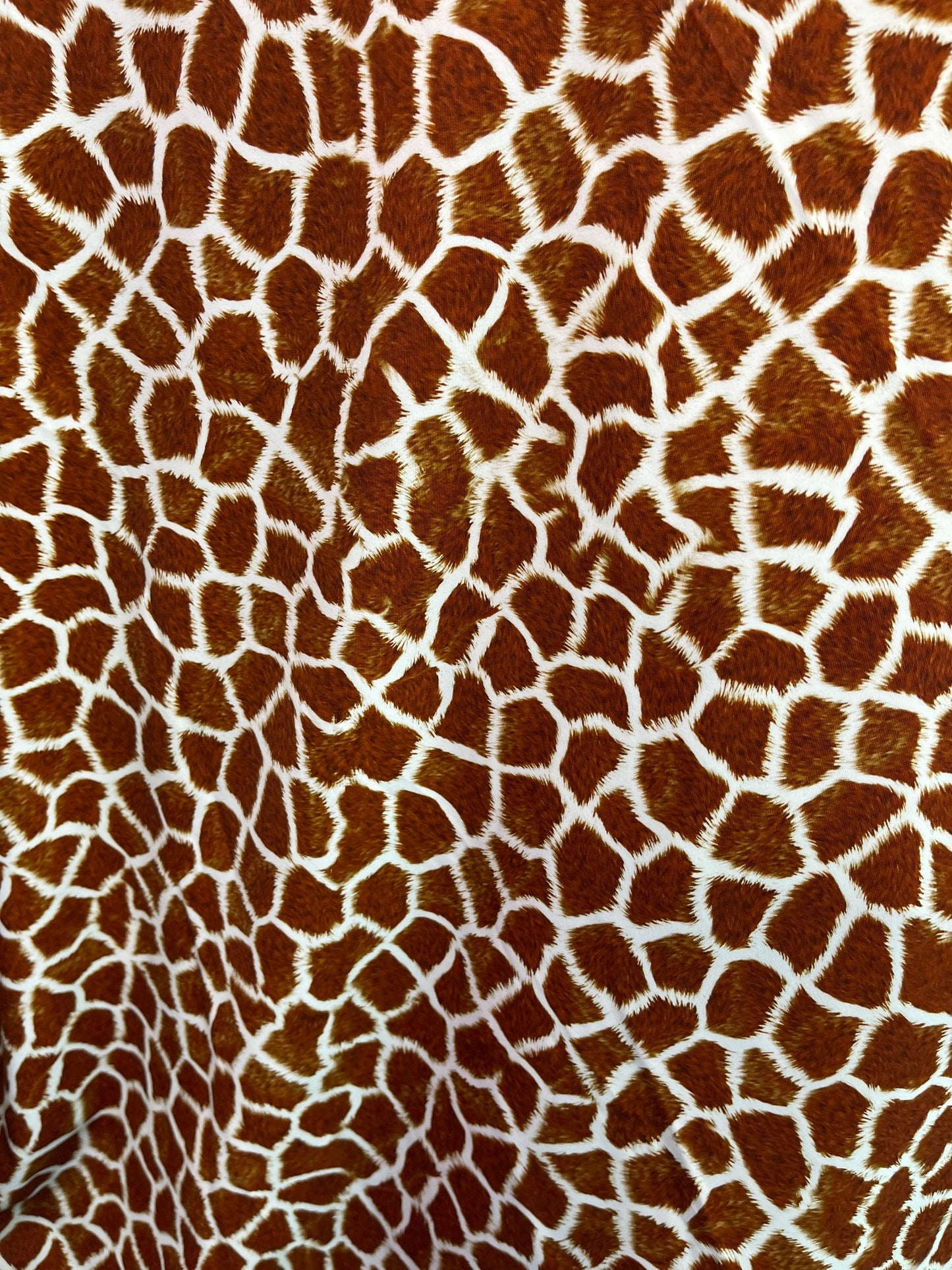 Exotic Giraffe design print on best quality of nylon spandex 4-way stretch 58/60” Sold by the YD. Ships Worldwide from Los Angeles CA USA.
