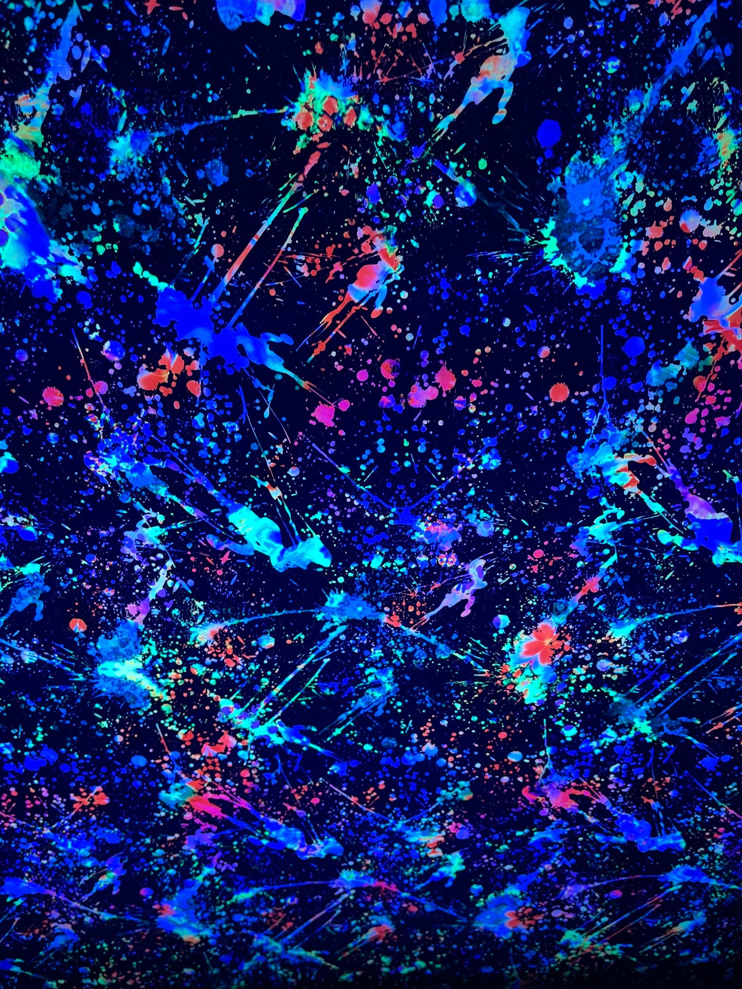 New splatter paint design Black/Multicolor print on nylon and mesh spandex 4-way stretch 58/60” Sold by the YD