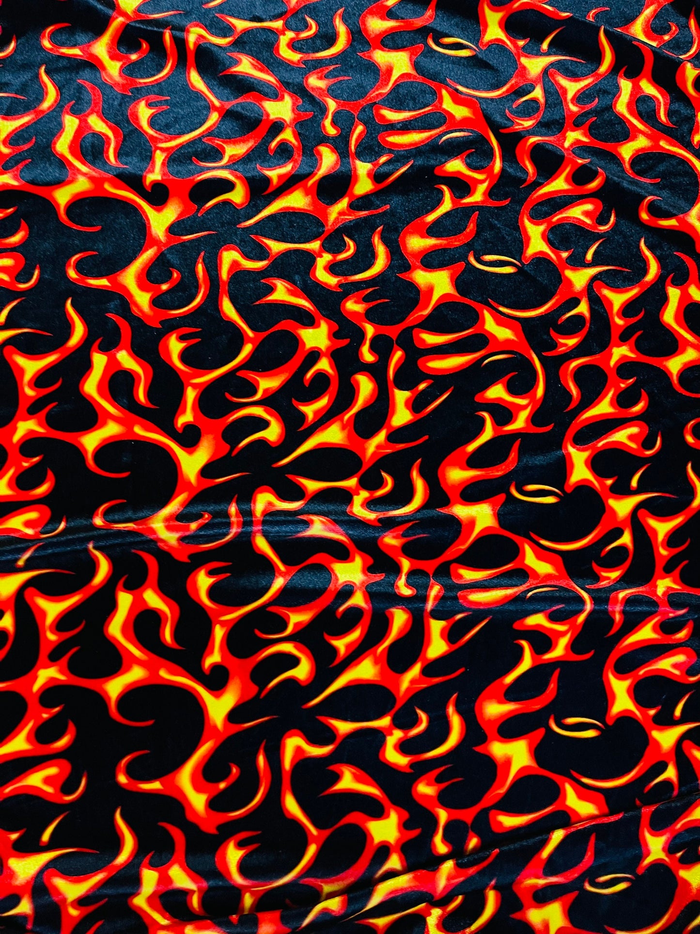 NEW Fire design Black/Red/Orange print on great quality of stretch velvet 4-way stretch 58/60” Sold by the YD. Ships Worldwide from L.A CA