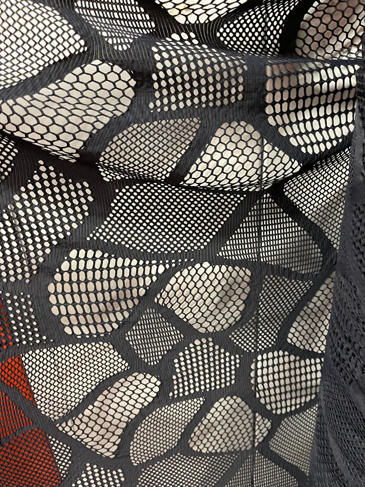 New Spiderweb multi design black mesh 4-way stretch 50/52” Sold by the YD. Ships Worldwide from Los Angeles California USA.