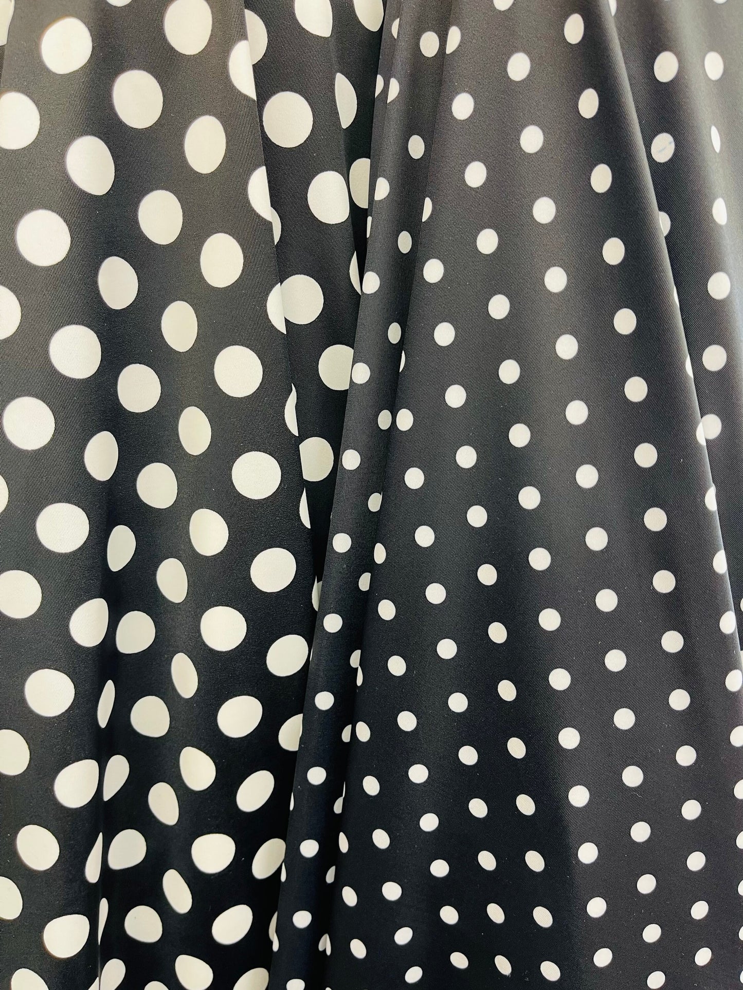 Polka dots design print on best quality of nylon spandex 4-way stretch 58/60” Sold by the YD. Ships Worldwide from Los Ángeles California