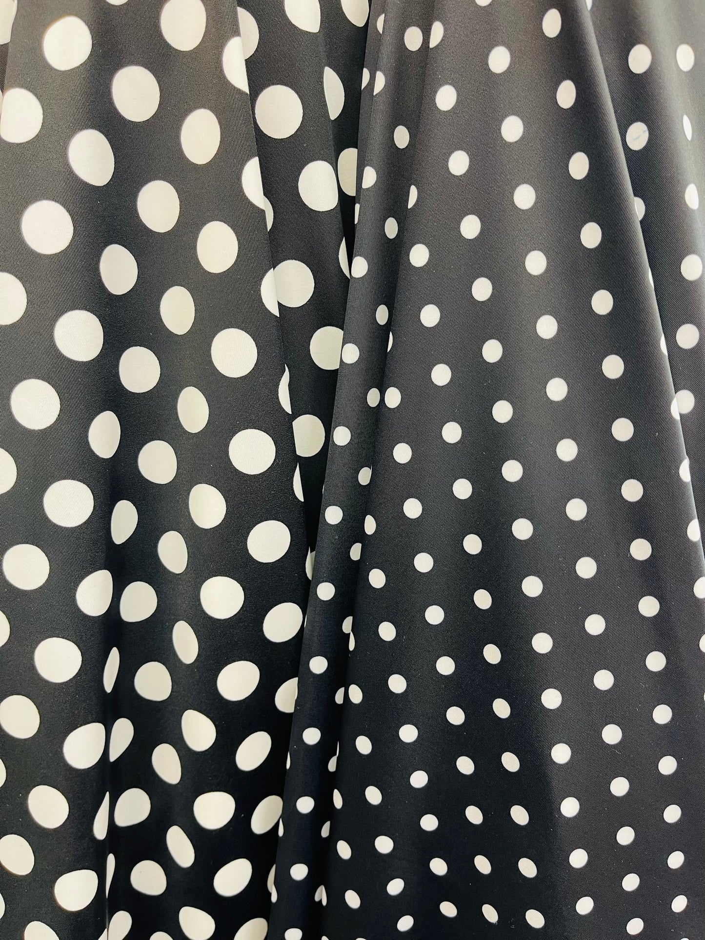 Polka dots design print on best quality of nylon spandex 4-way stretch 58/60” Sold by the YD. Ships Worldwide from Los Ángeles California
