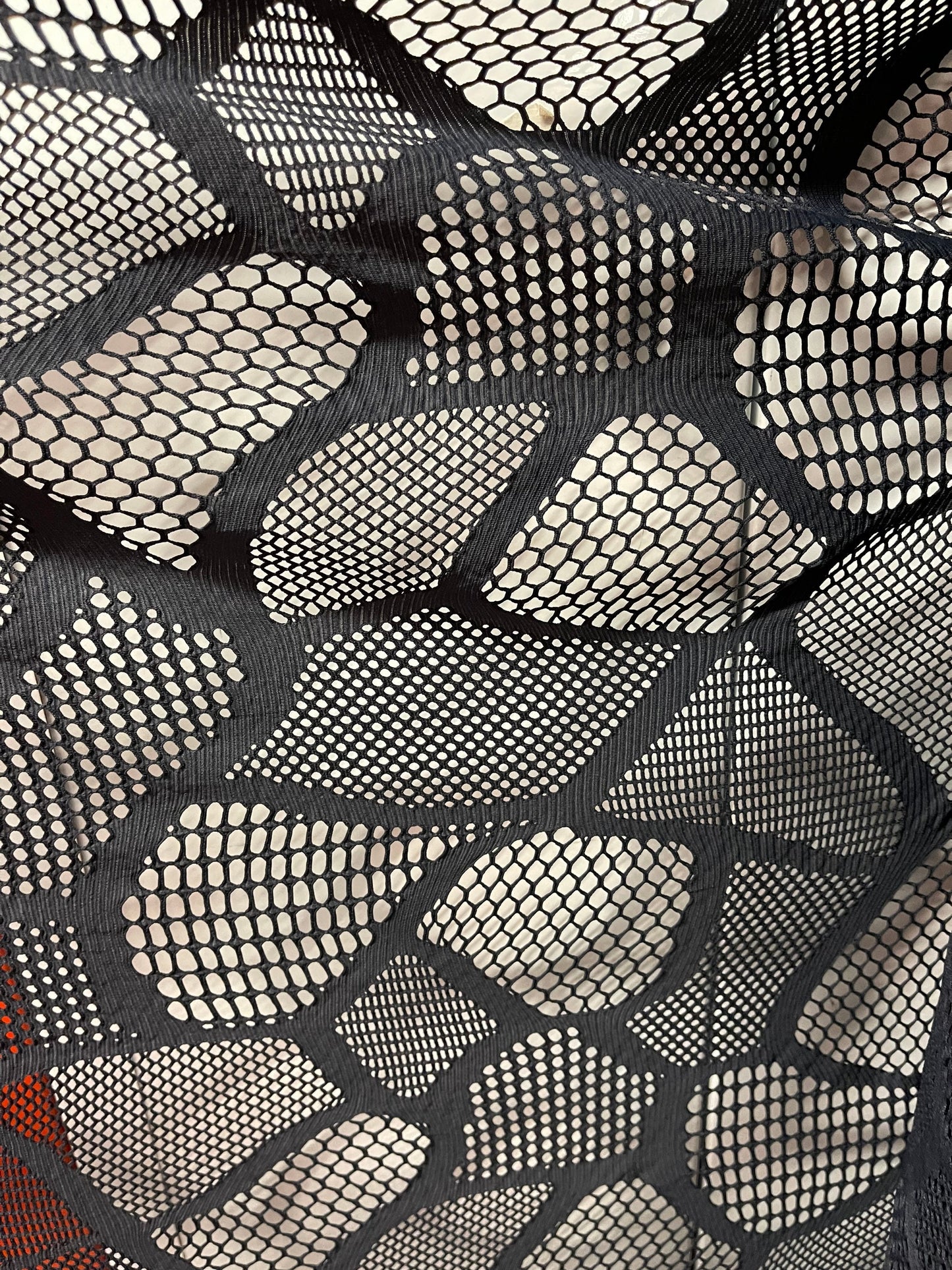 New Spiderweb multi design black mesh 4-way stretch 50/52” Sold by the YD. Ships Worldwide from Los Angeles California USA.