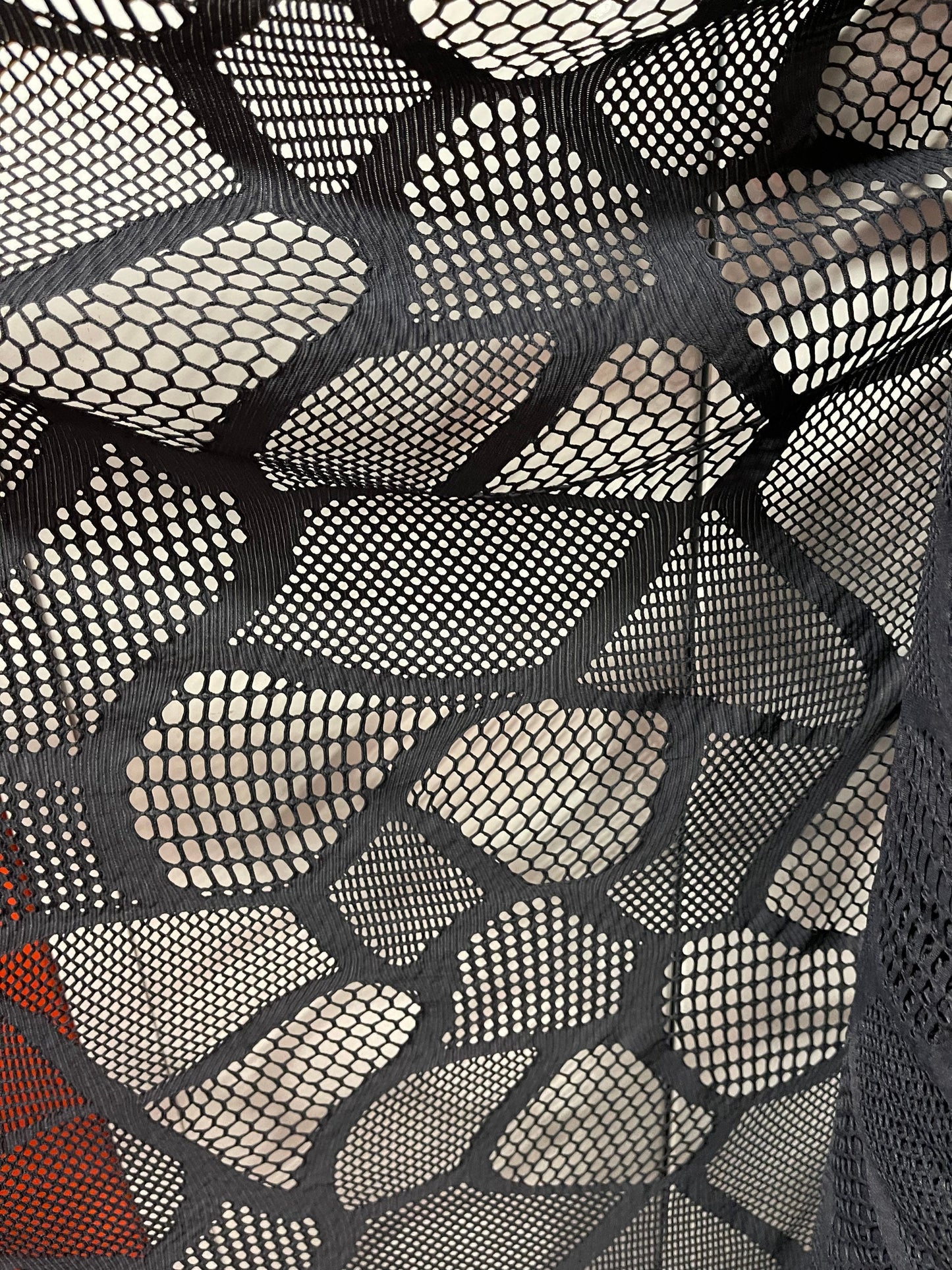 New Spiderweb multi design black mesh 4-way stretch 50/52” Sold by the YD. Ships Worldwide from Los Angeles California USA.