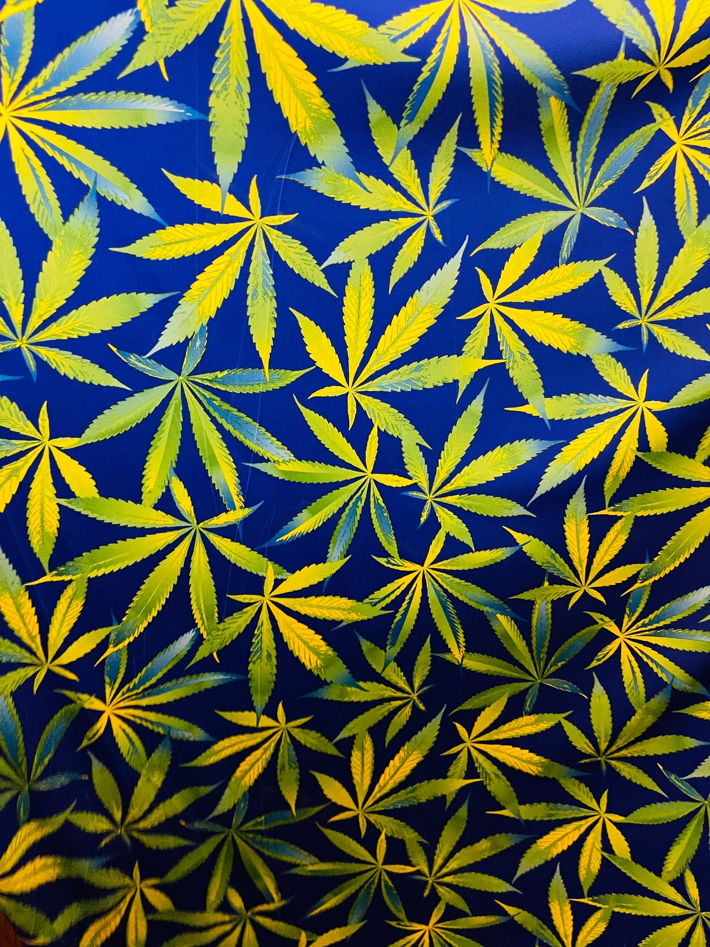 Marijuana leaf design print on best quality of nylon spandex 4-way stretch 58/60” Sold by the YD. Ships Worldwide from Los Angeles CA