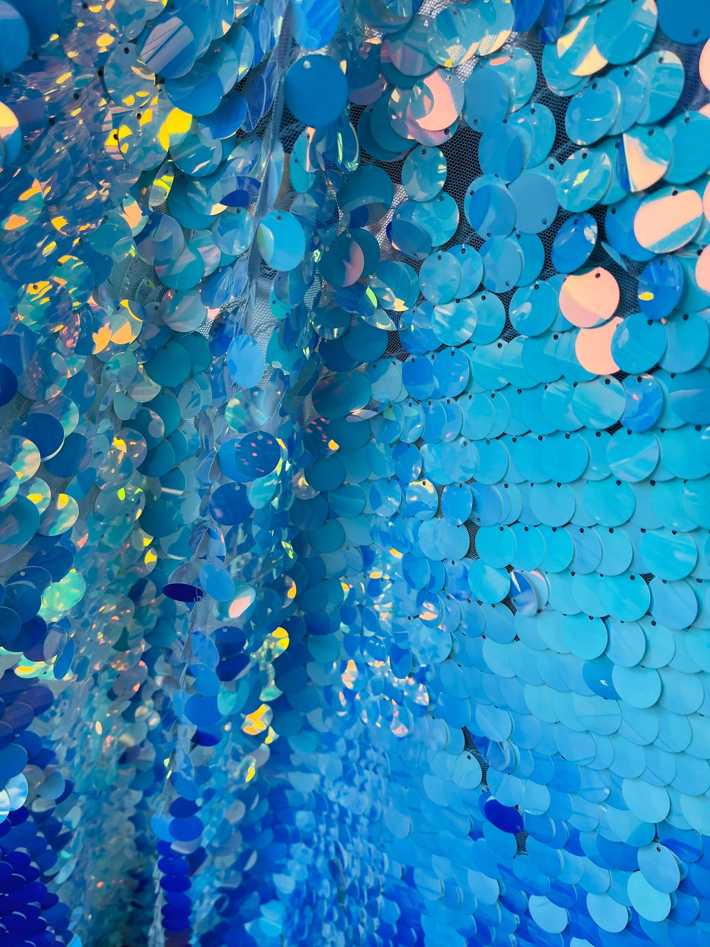 Paillette sequins medium size iridescent mirror white stretch mesh base 2way 58/60” Sold by the YD. Ships worldwide from Los Angeles CA USA