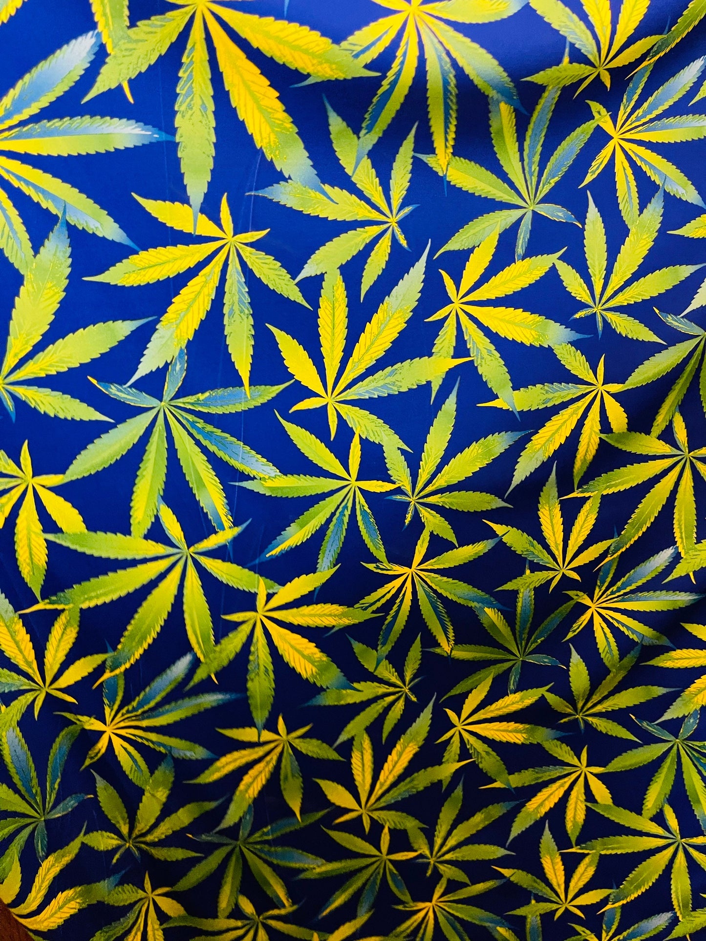 Marijuana leaf design print on best quality of nylon spandex 4-way stretch 58/60” Sold by the YD. Ships Worldwide from Los Angeles CA