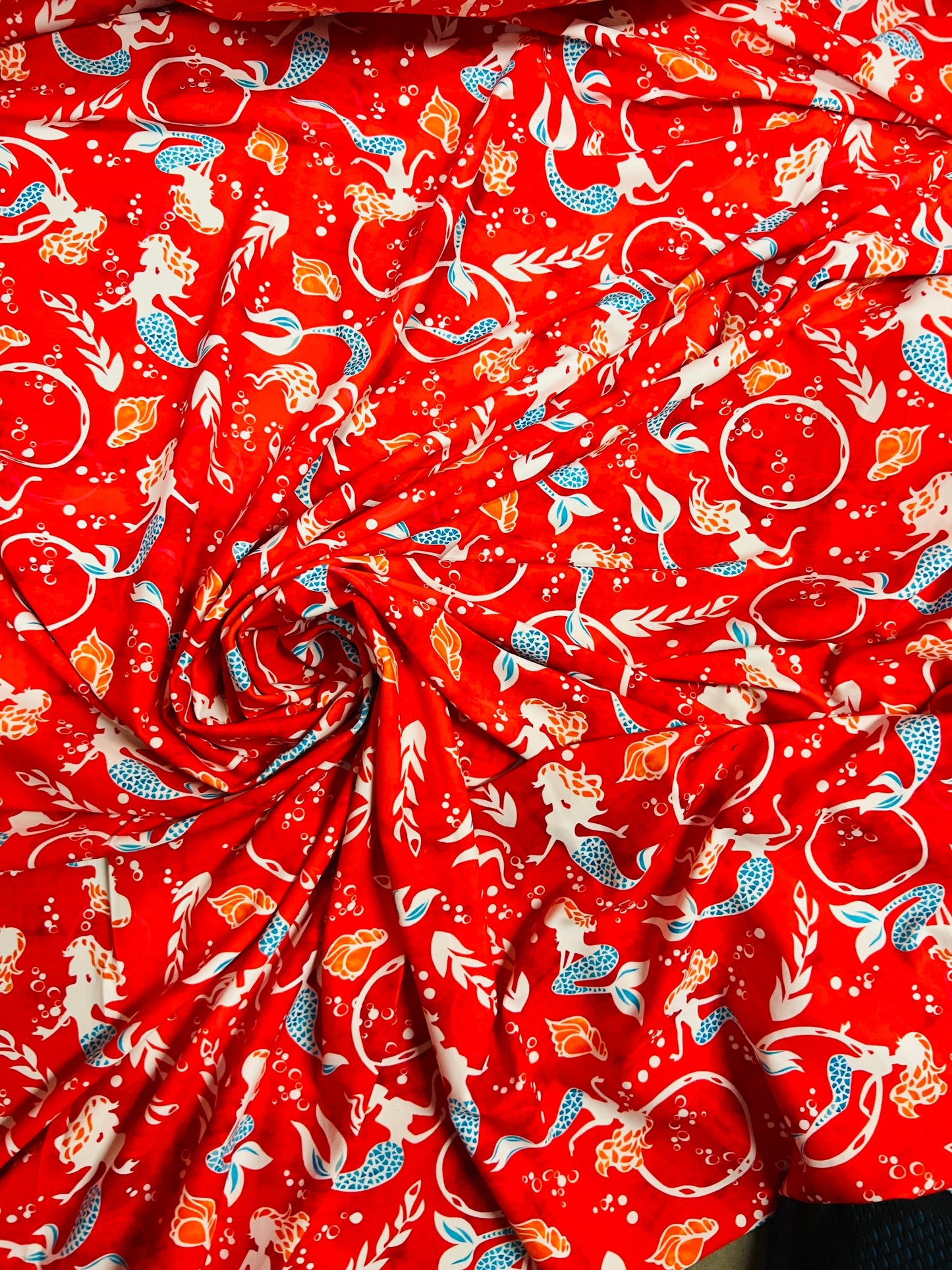 Mermaid design print on best quality of nylon spandex 4-way stretch 58/60” Sold by the YD. Ships worldwide from Los Angeles California USA.
