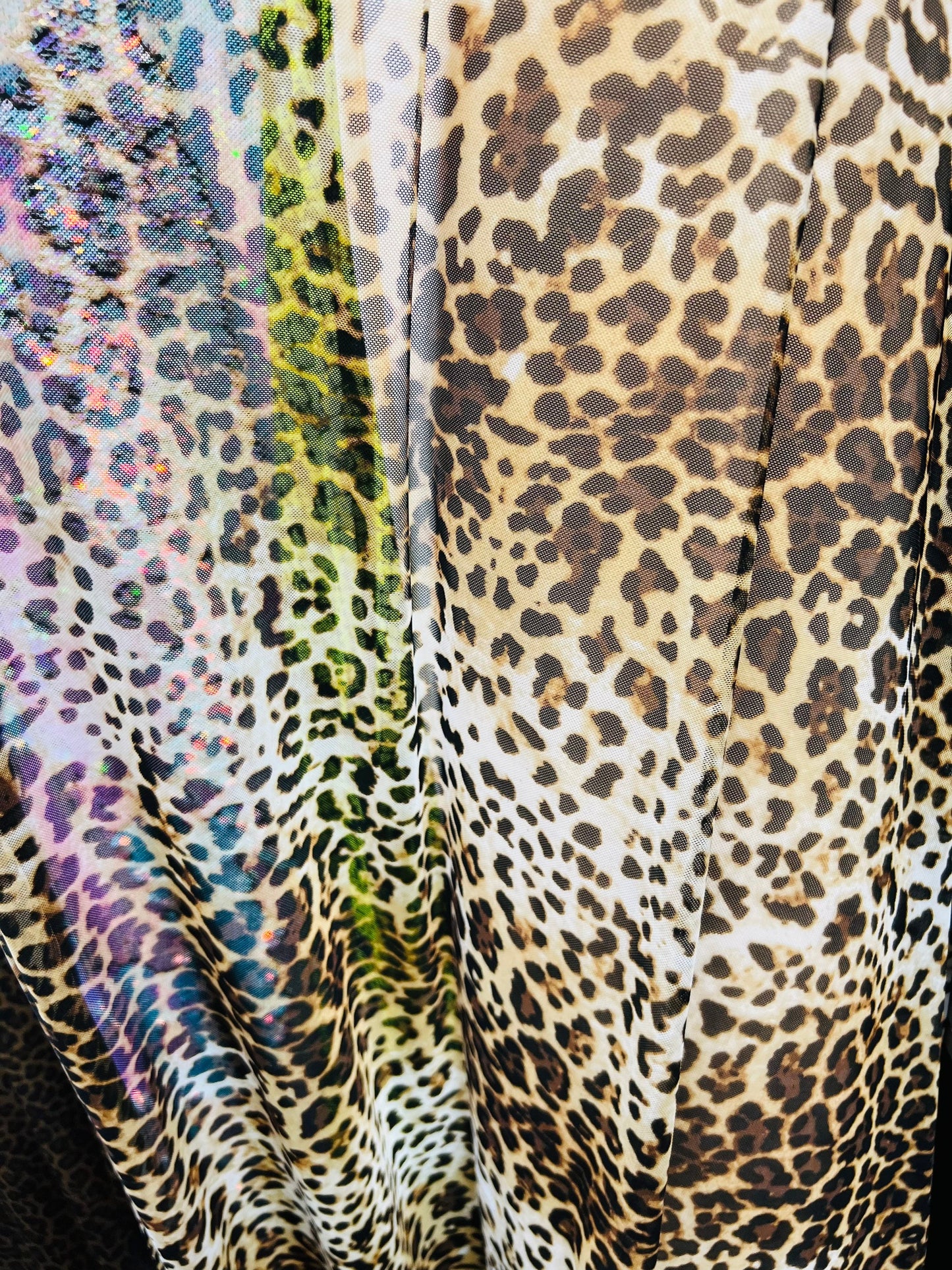 Leopard design print on great quality of power mesh 4-way stretch 58/60” Sold by the YD. Ships worldwide from Los Angeles California USA.