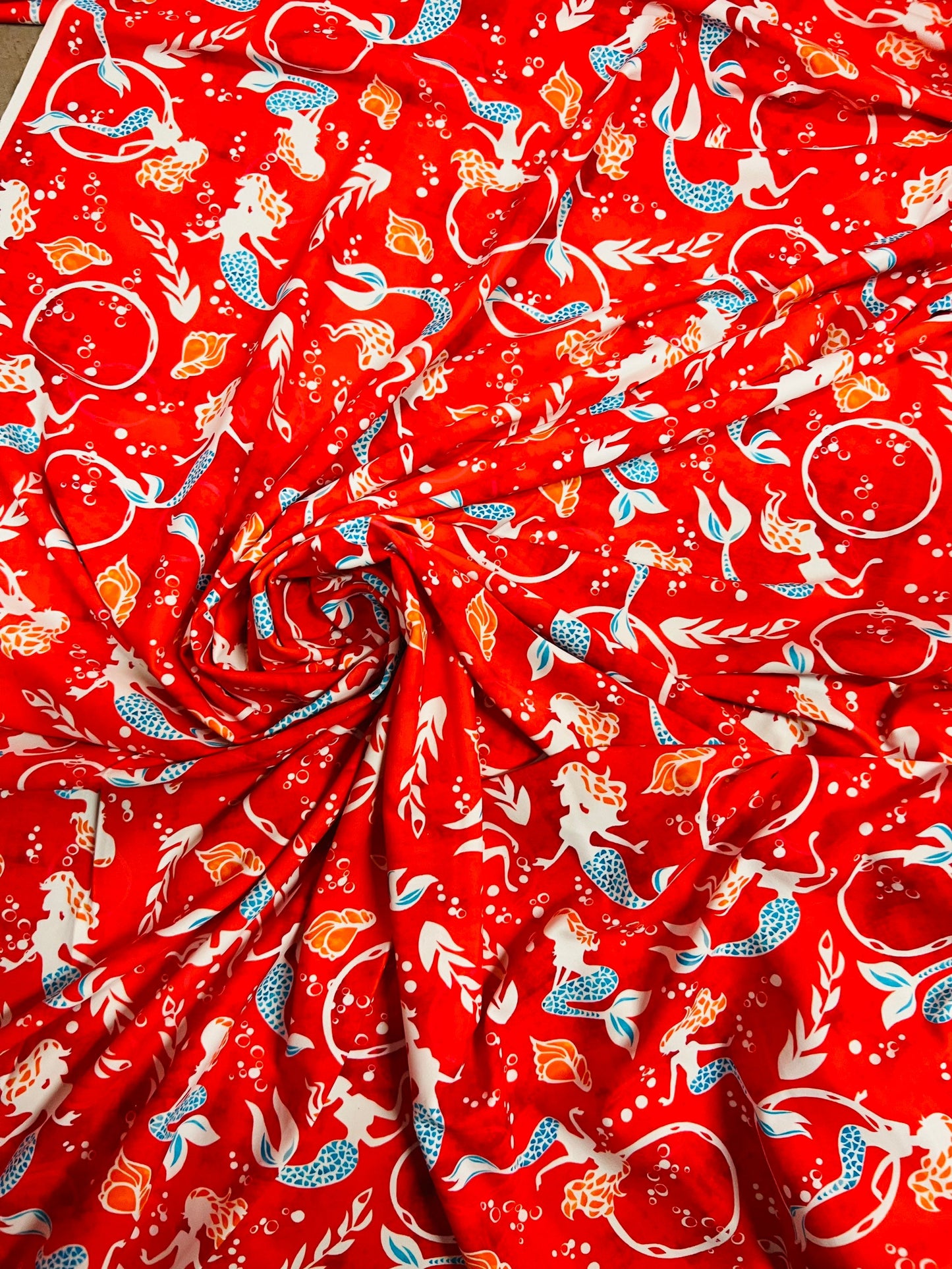 Mermaid design print on best quality of nylon spandex 4-way stretch 58/60” Sold by the YD. Ships worldwide from Los Angeles California USA.