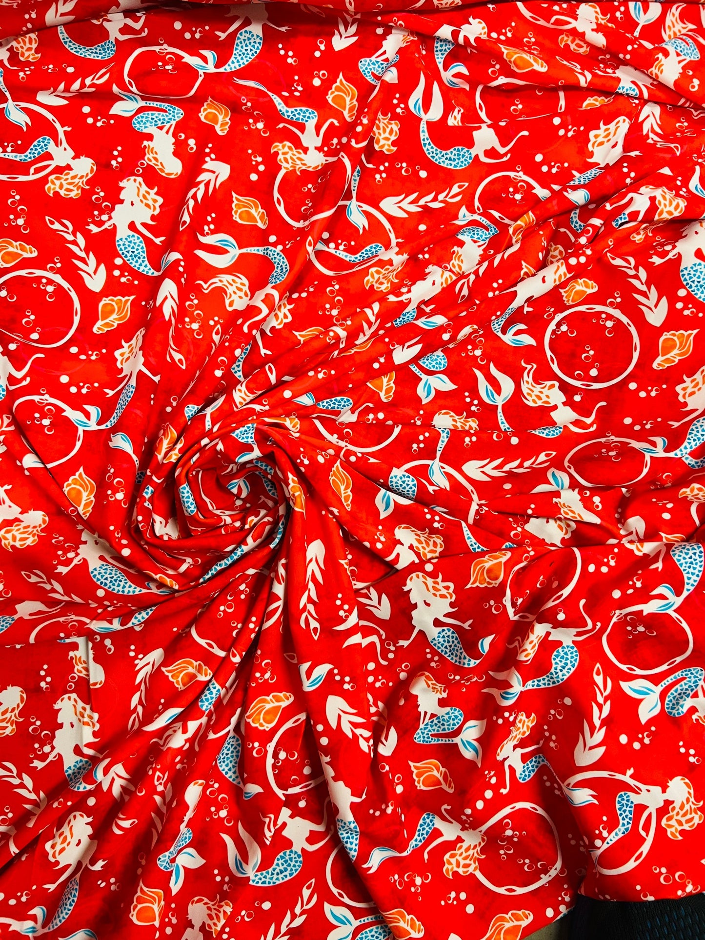 Mermaid design print on best quality of nylon spandex 4-way stretch 58/60” Sold by the YD. Ships worldwide from Los Angeles California USA.