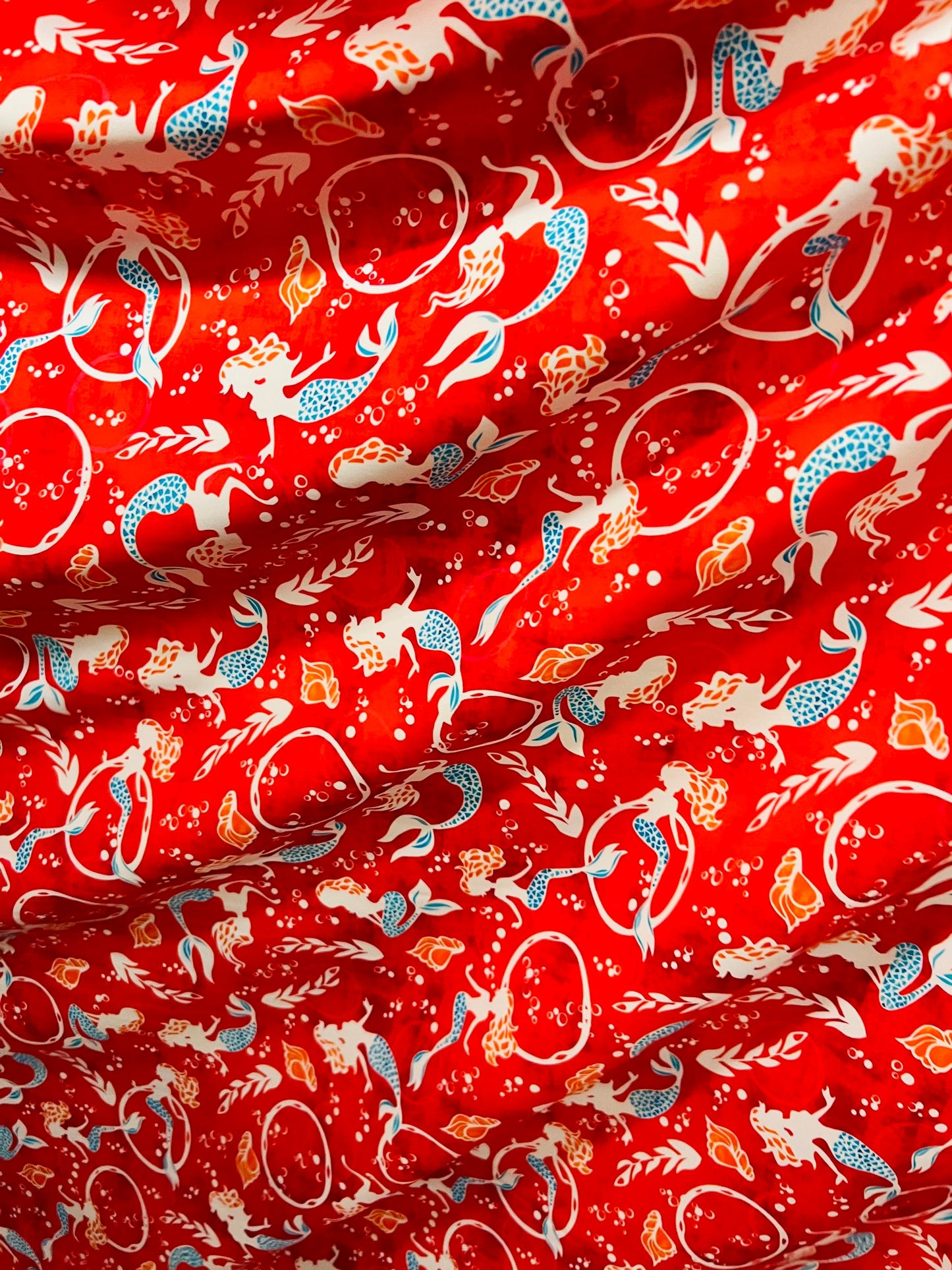 Mermaid design print on best quality of nylon spandex 4-way stretch 58/60” Sold by the YD. Ships worldwide from Los Angeles California USA.