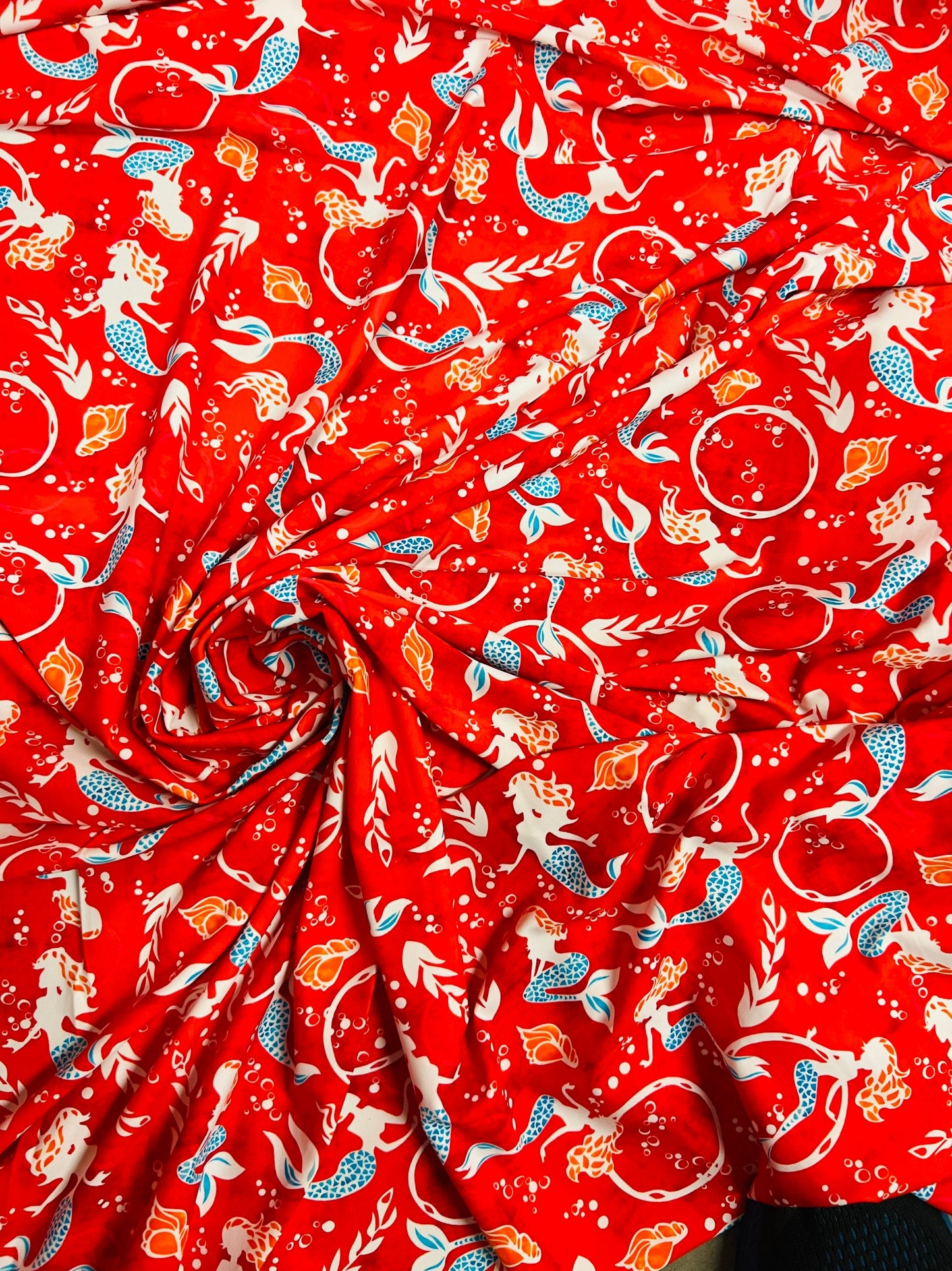 Mermaid design print on best quality of nylon spandex 4-way stretch 58/60” Sold by the YD. Ships worldwide from Los Angeles California USA.