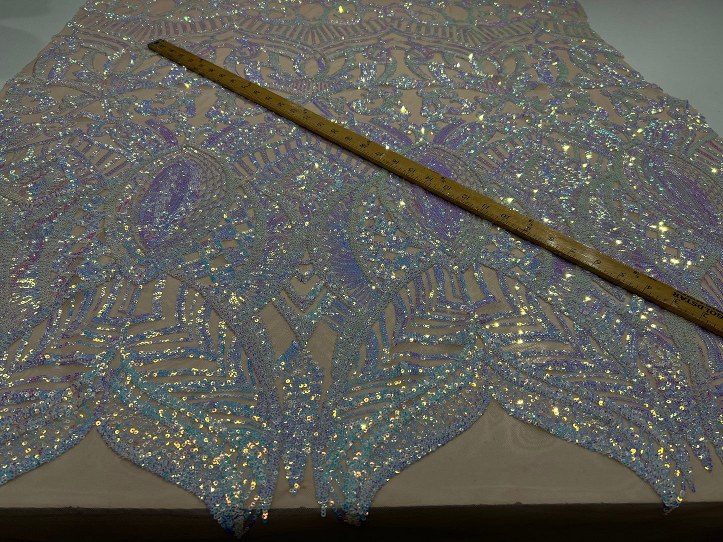 New Luxury iridescent sequins Pamela design embroidered on 4-way stretch mesh 55/57” Sold by the YD. Ships Worldwide from Los Ángeles CA