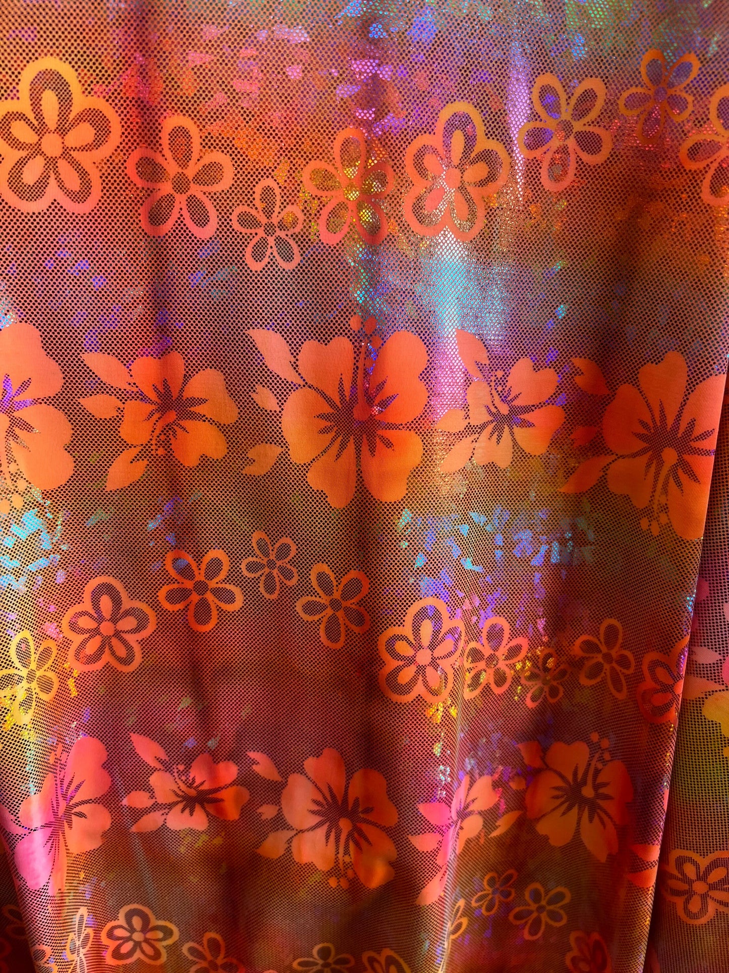 Hawaiian design hologram metallic nylon spandex 4-way stretch 58/60” Sold by the YD. Ships Worldwide from Los Angeles California USA.