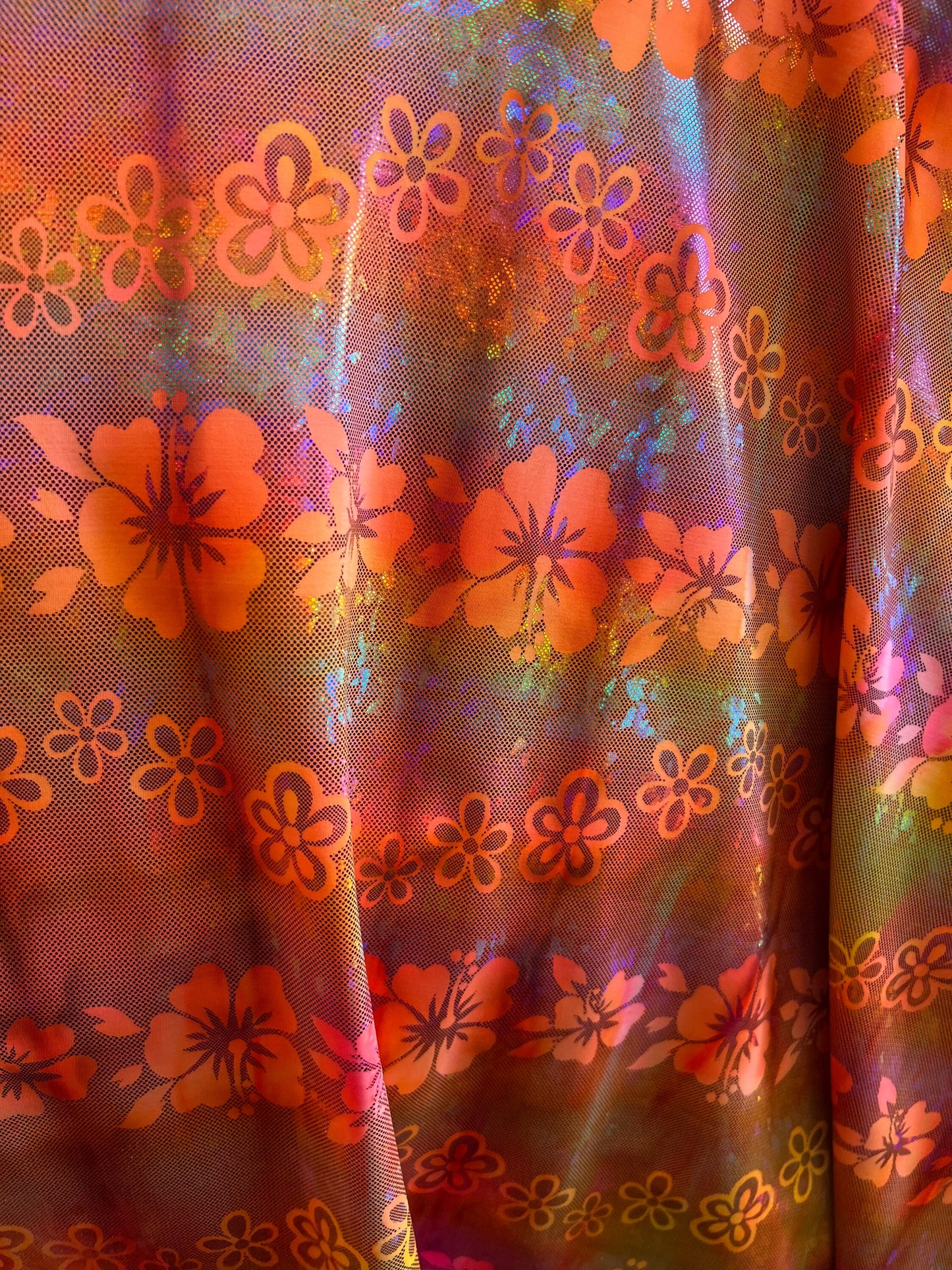 Hawaiian design hologram metallic nylon spandex 4-way stretch 58/60” Sold by the YD. Ships Worldwide from Los Angeles California USA.