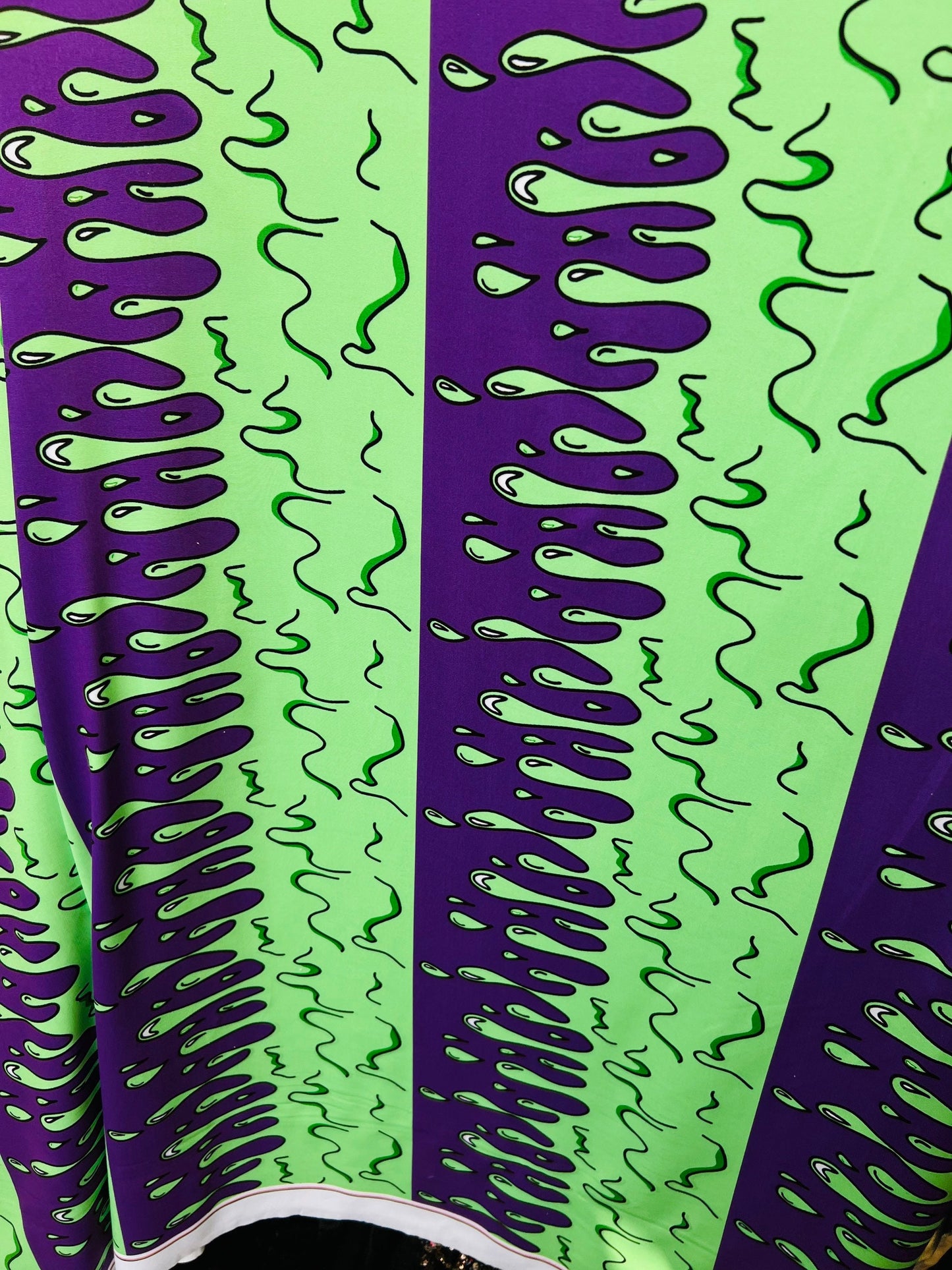Abstract design green/purple print on great quality of poly spandex 4-way stretch 58/60” Sold by the YD. Ships Worldwide from Los Ángeles CA