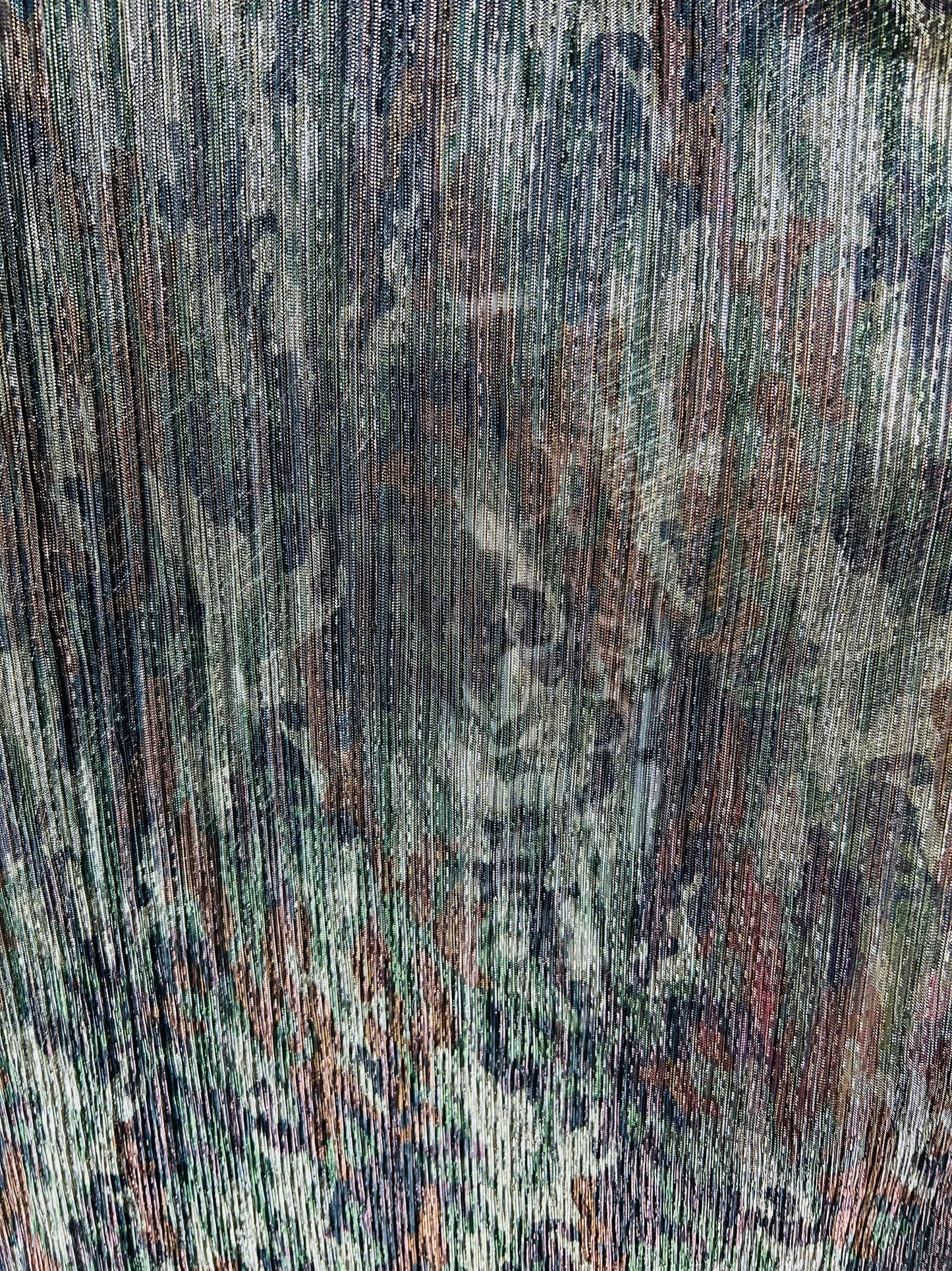 New camouflage design print on metallic mesh pleated 2-way stretch 58/60” Sold by the YD. Ships Worldwide from Los Angeles California USA.