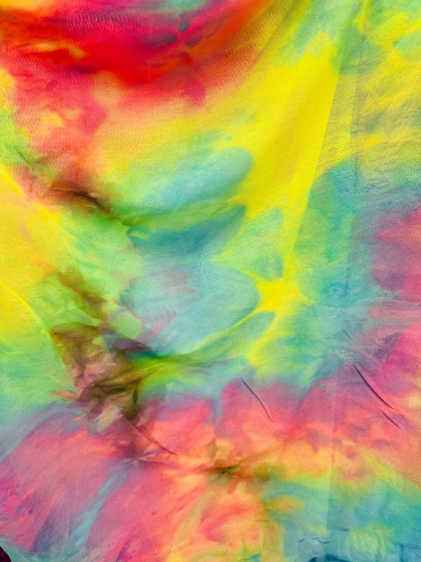Tie dye design power mesh 4-way stretch 58/60” Sold by the YD. Ships Worldwide from Los Angeles California USA.