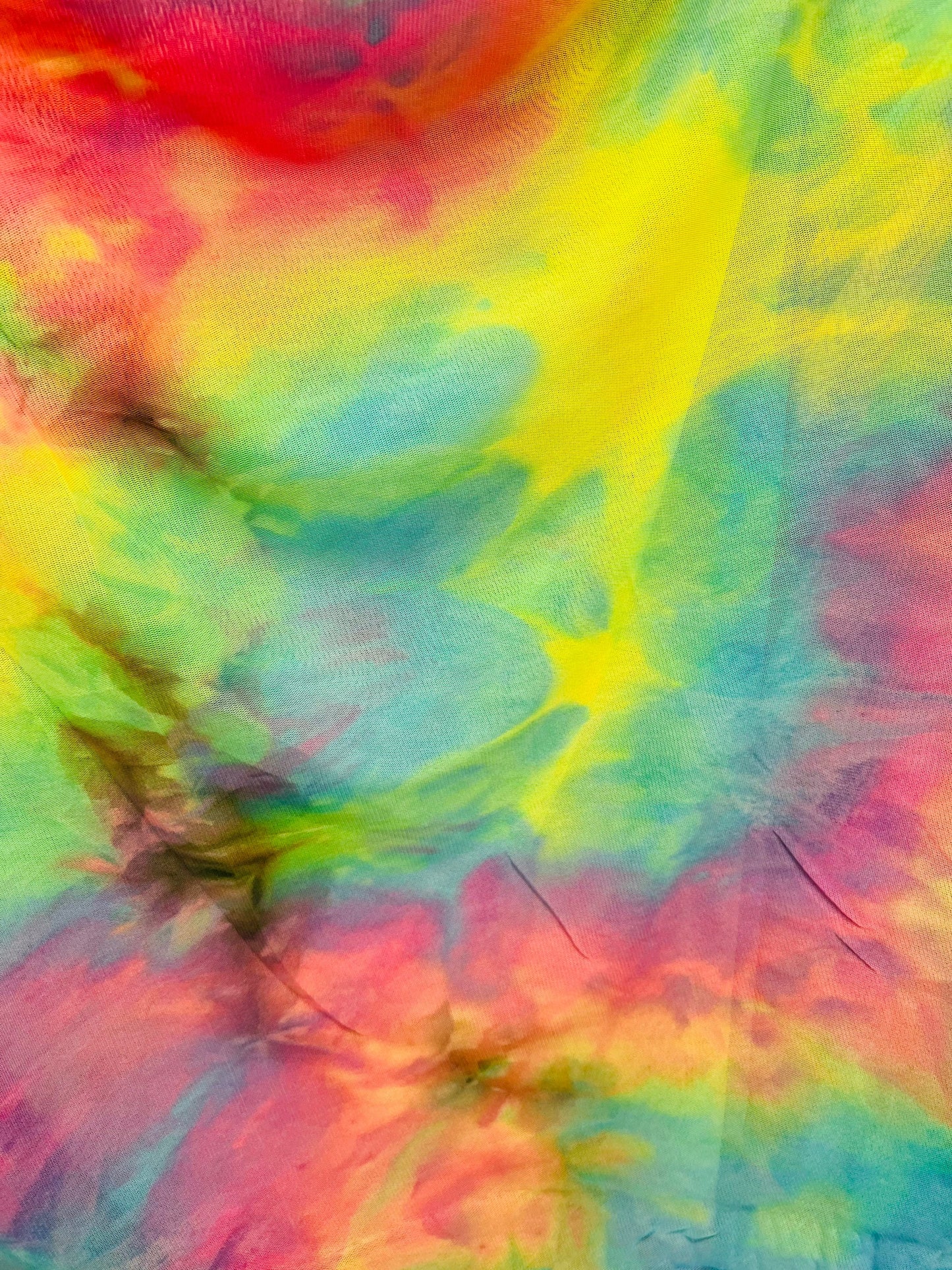 Tie dye design power mesh 4-way stretch 58/60” Sold by the YD. Ships Worldwide from Los Angeles California USA.